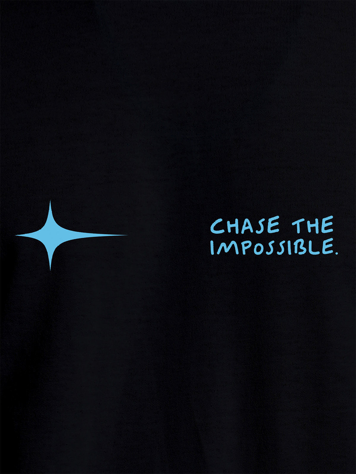 Close up of 'Chase The Impossible' design on Women's Black Round Neck T-shirt, highlighting intricate details and vibrant print.