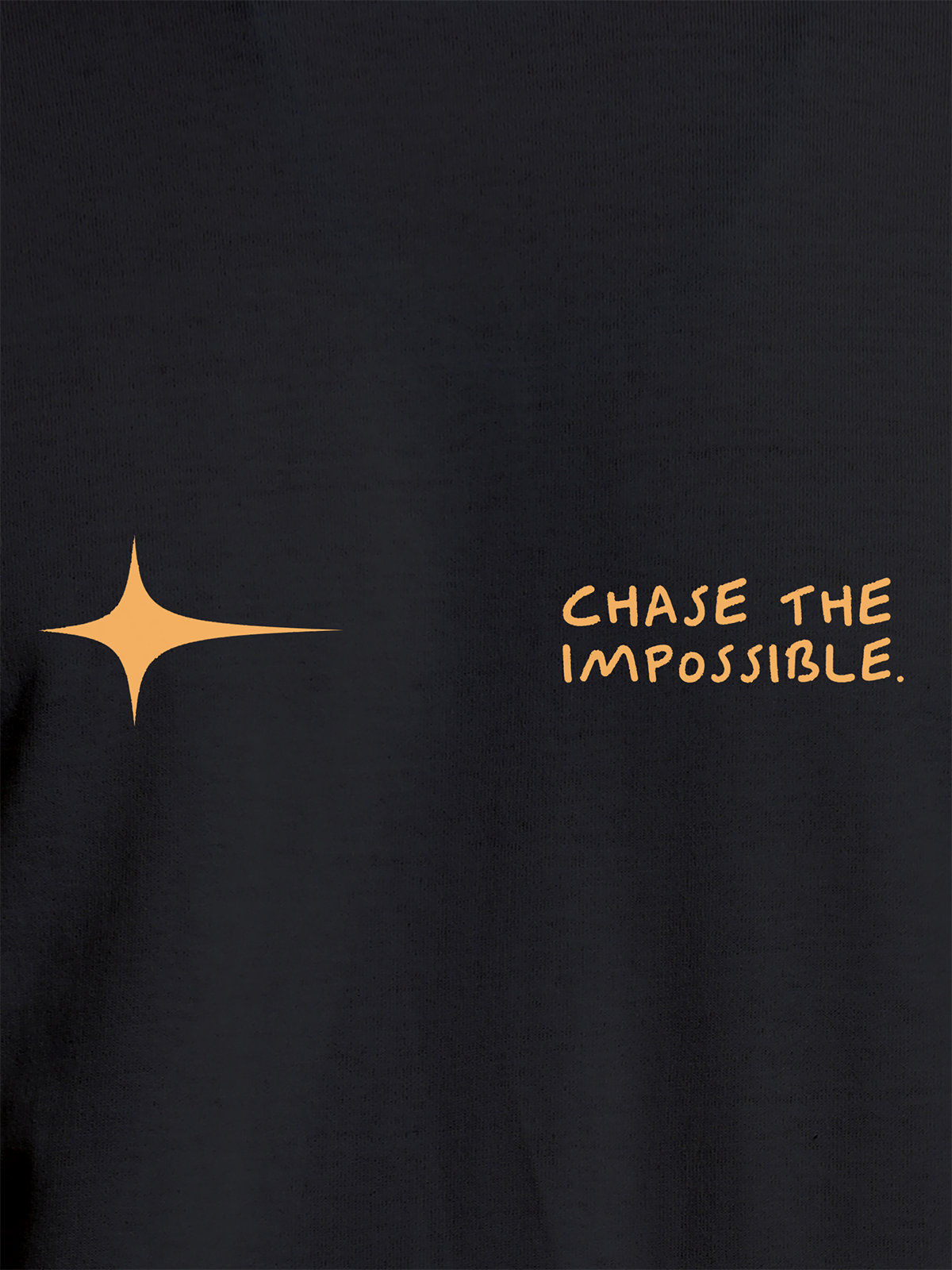 Close up of 'Chase The Impossible' design on Women's Dark Grey Round Neck T-shirt, highlighting intricate details and vibrant print.
