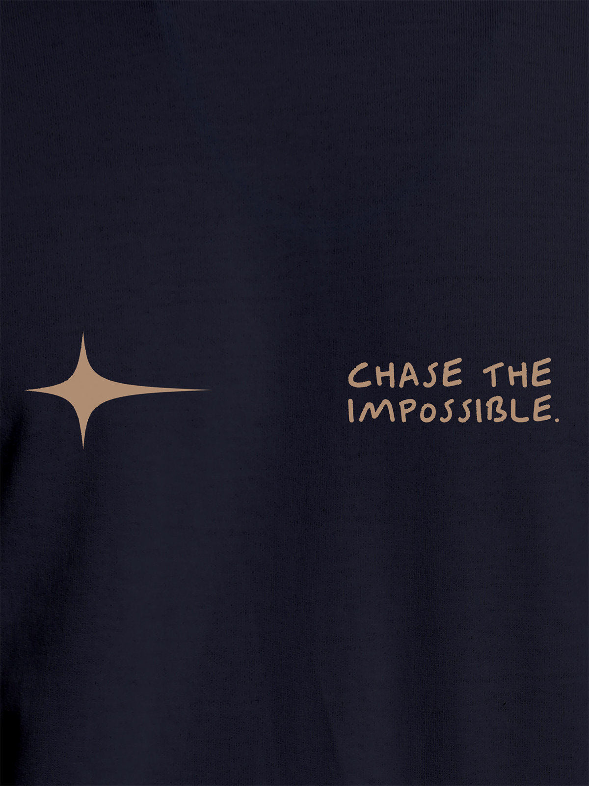 Close up of 'Chase The Impossible' design on Women's Navy Blue Round Neck T-shirt, highlighting intricate details and vibrant print.