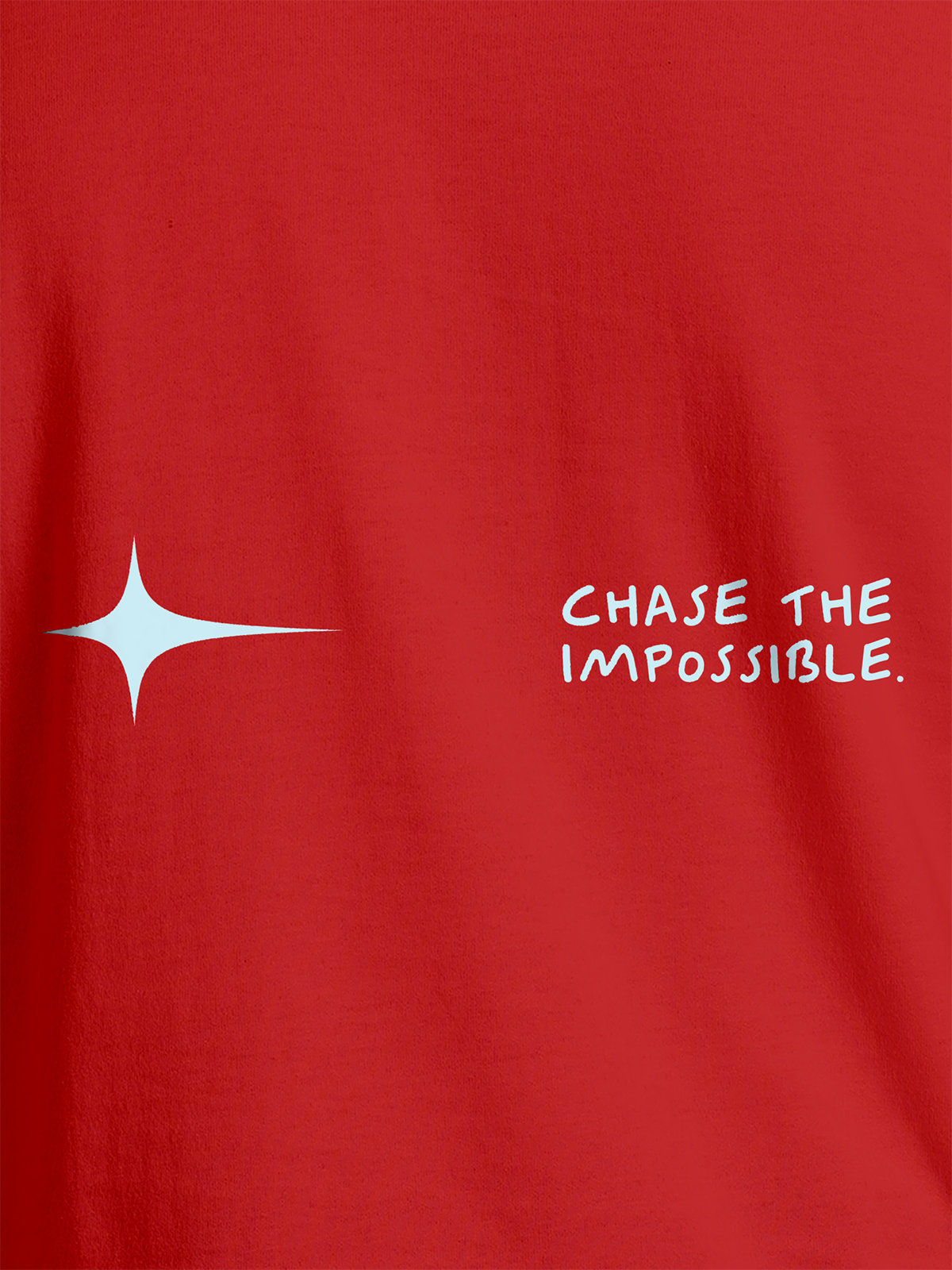 Close up of 'Chase The Impossible' design on Men's Red Round Neck T-shirt, highlighting intricate details and vibrant print.