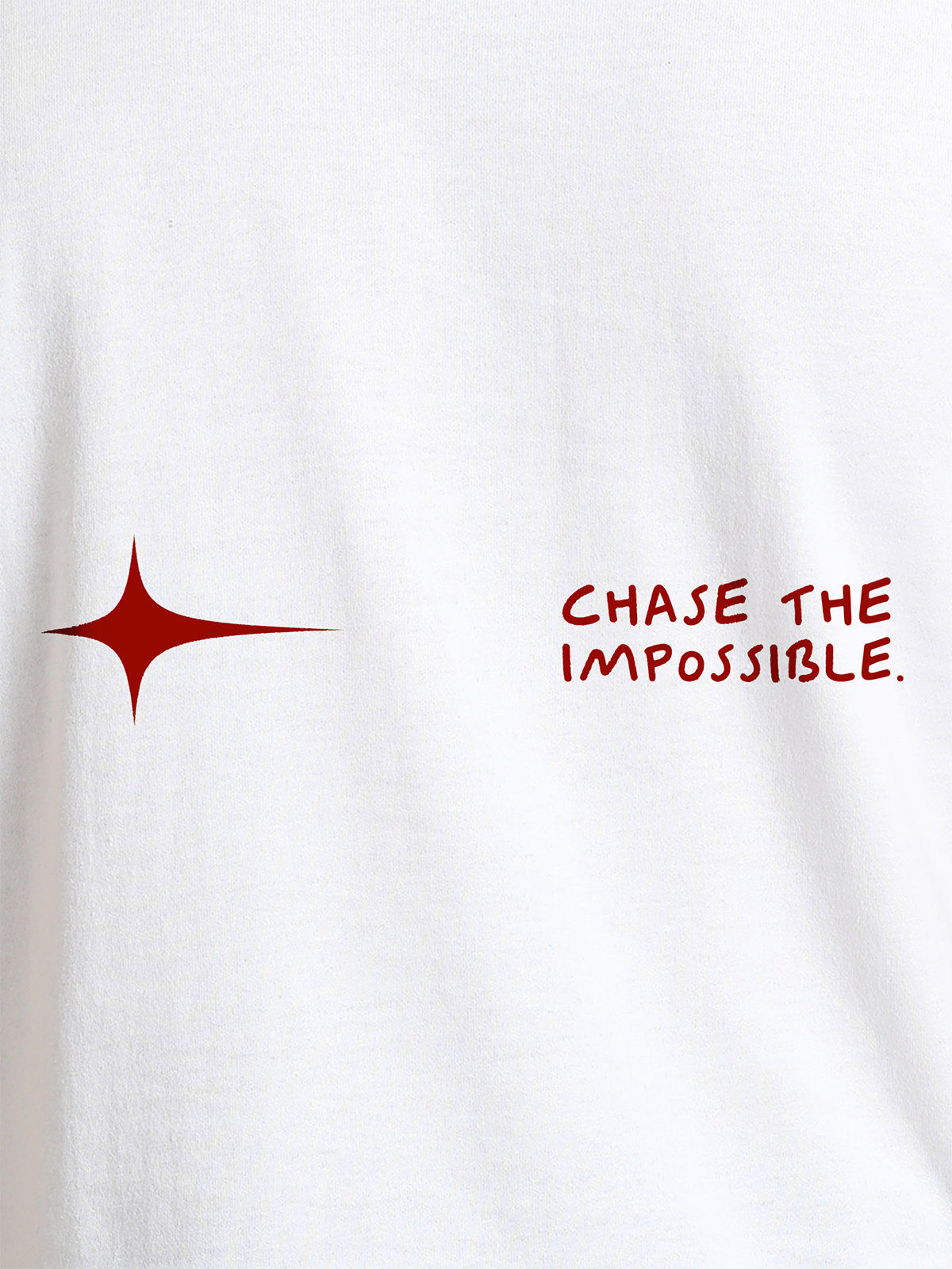 Close up of 'Chase The Impossible' design on Men's White Round Neck T-shirt, highlighting intricate details and vibrant print.