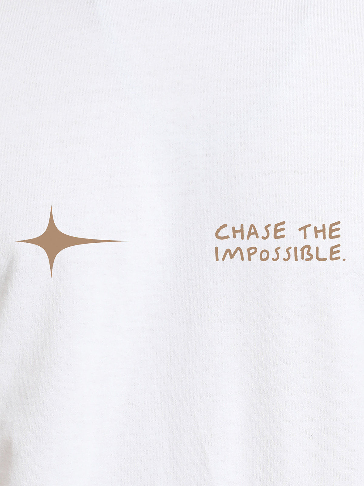 Close up of 'Chase The Impossible' design on Women's White Round Neck T-shirt, highlighting intricate details and vibrant print.