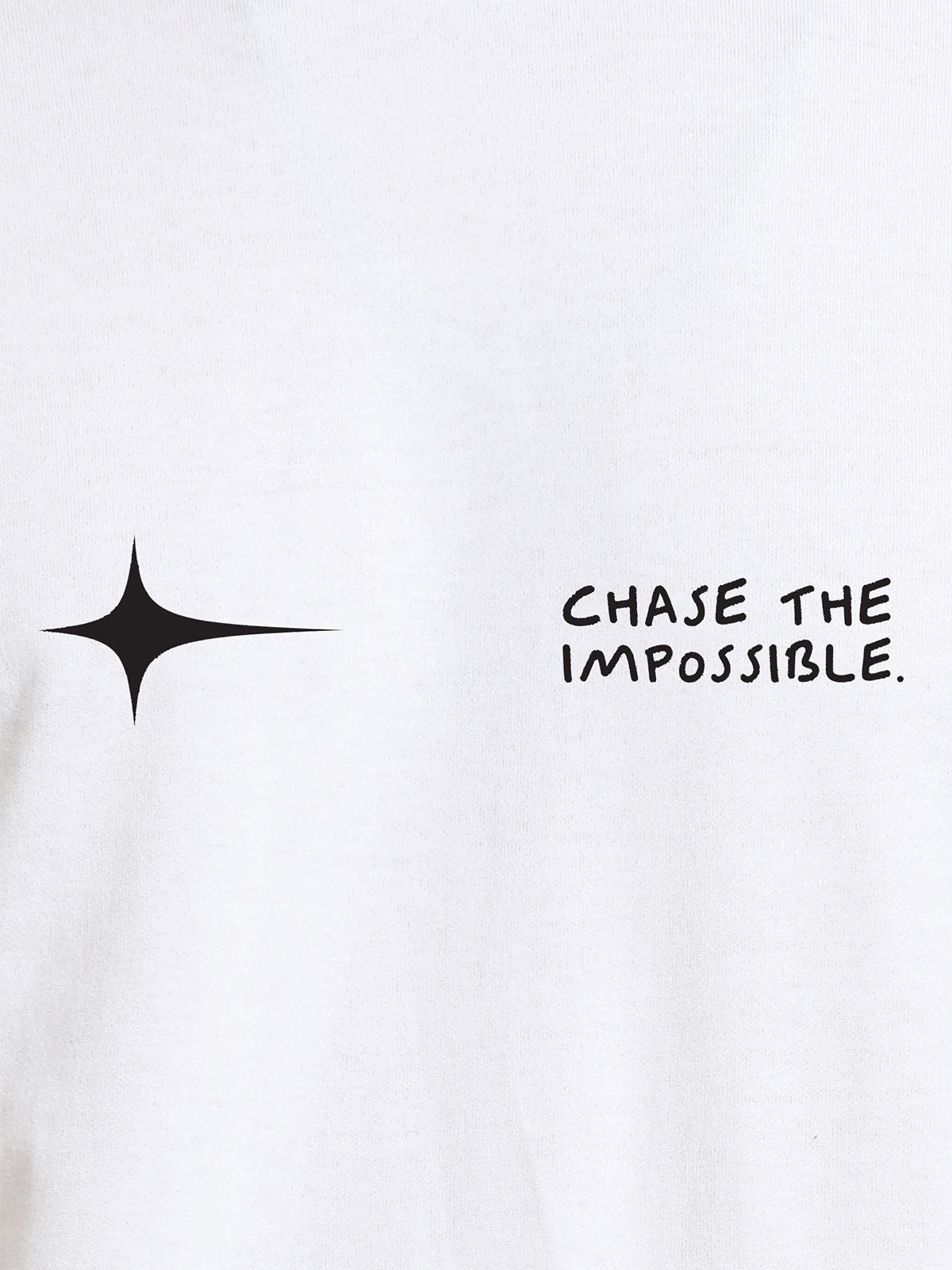 Close up of 'Chase The Impossible' design on Women's White Round Neck T-shirt, highlighting intricate details and vibrant print.