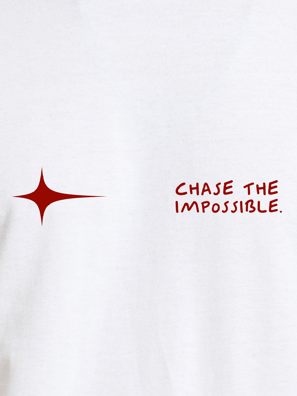 Close up of 'Chase The Impossible' design on Women's White Round Neck T-shirt, highlighting intricate details and vibrant print.