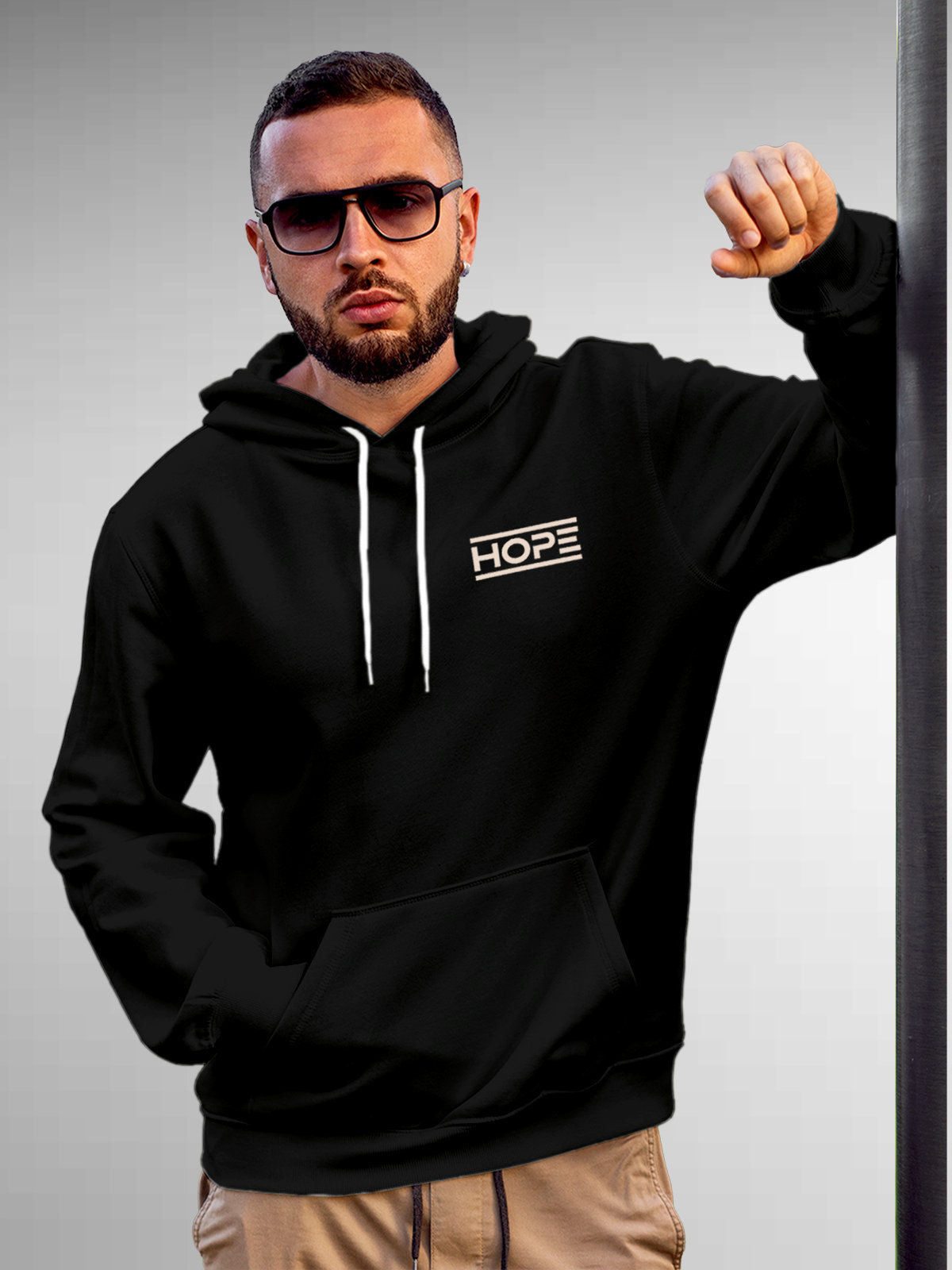 Model wearing Men's Black Hoodie Sweatshirt with 'Hope' design, offering effortless style and premium comfort