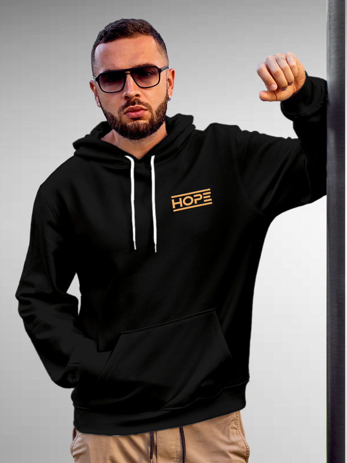 Model wearing Men's Black Hoodie Sweatshirt with 'Hope' design, offering effortless style and premium comfort