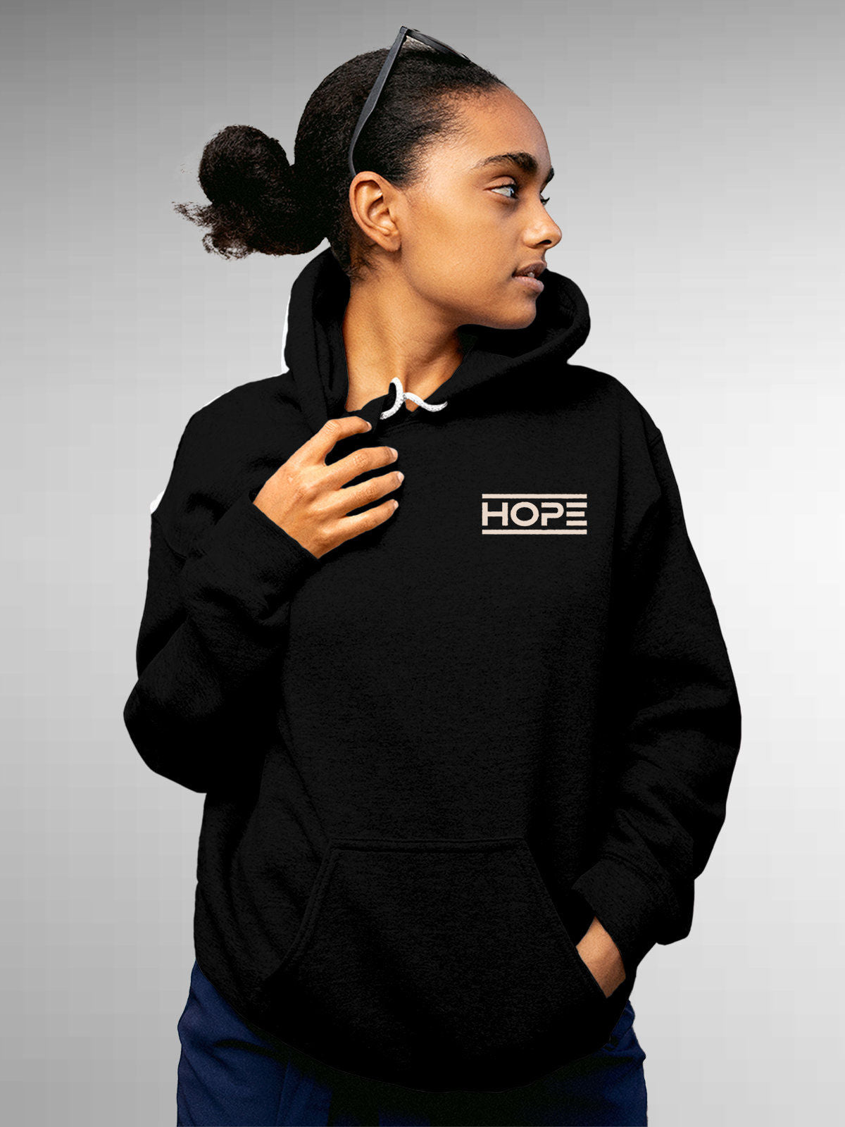 Model wearing Women's Black Hoodie Sweatshirt with 'Hope' design, offering effortless style and premium comfort