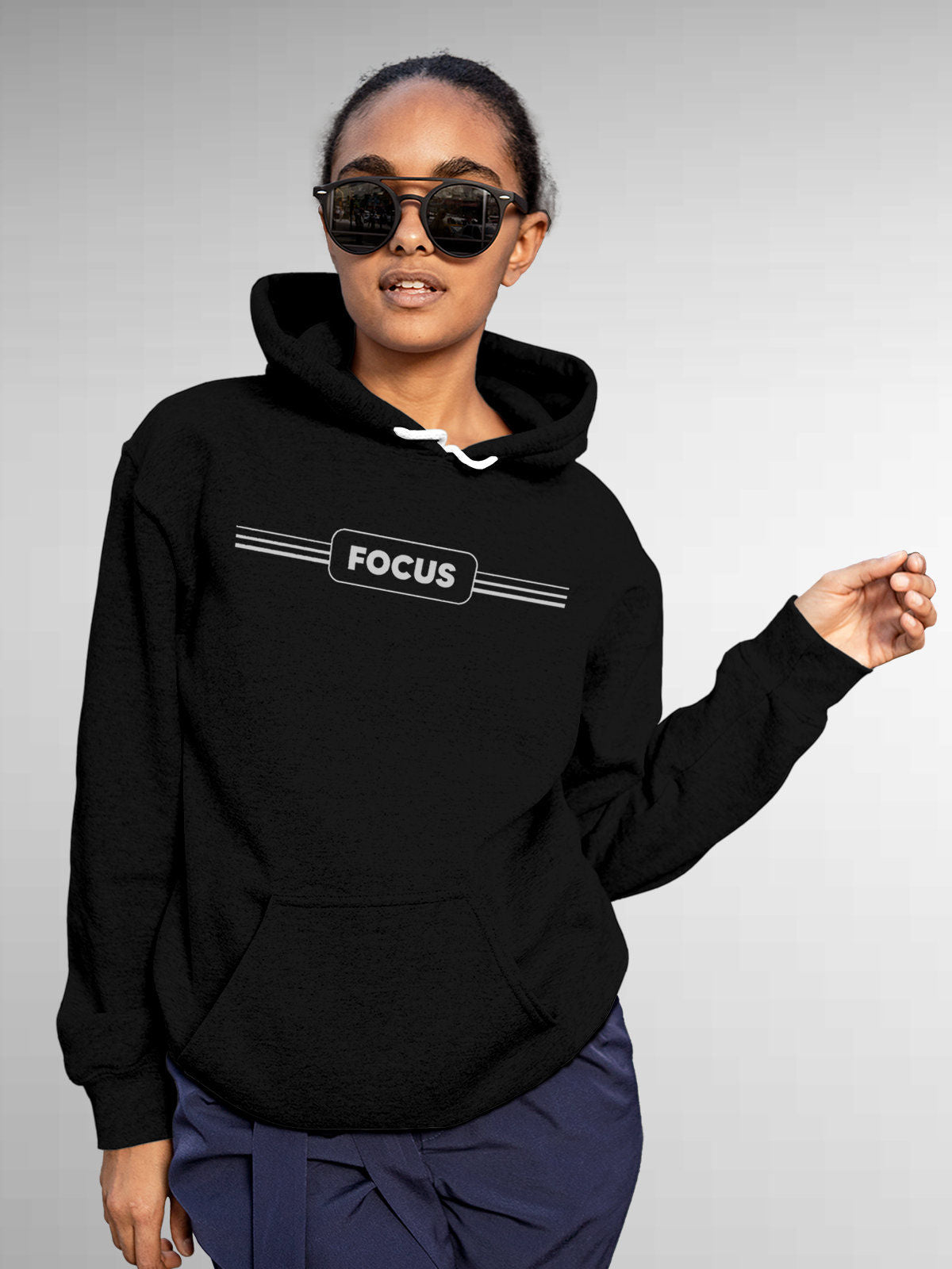 Model wearing Women's Black Hoodie Sweatshirt with 'Focus' design, offering effortless style and premium comfort