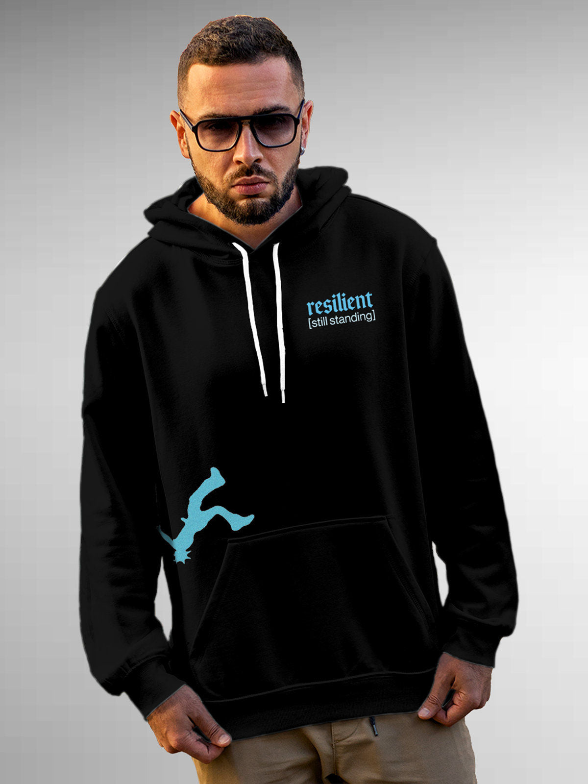 Model wearing Men's Black Hoodie Sweatshirt with 'Resilient' design, offering effortless style and premium comfort