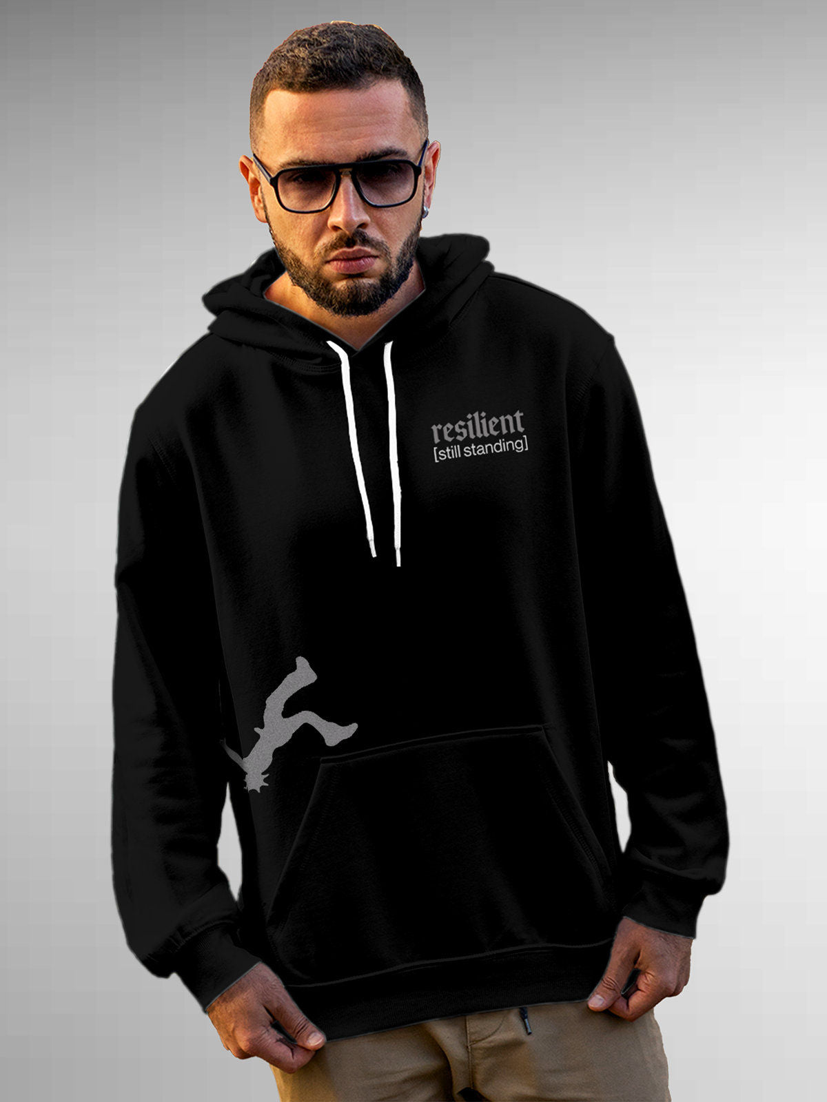 Model wearing Men's Black Hoodie Sweatshirt with 'Resilient' design, offering effortless style and premium comfort