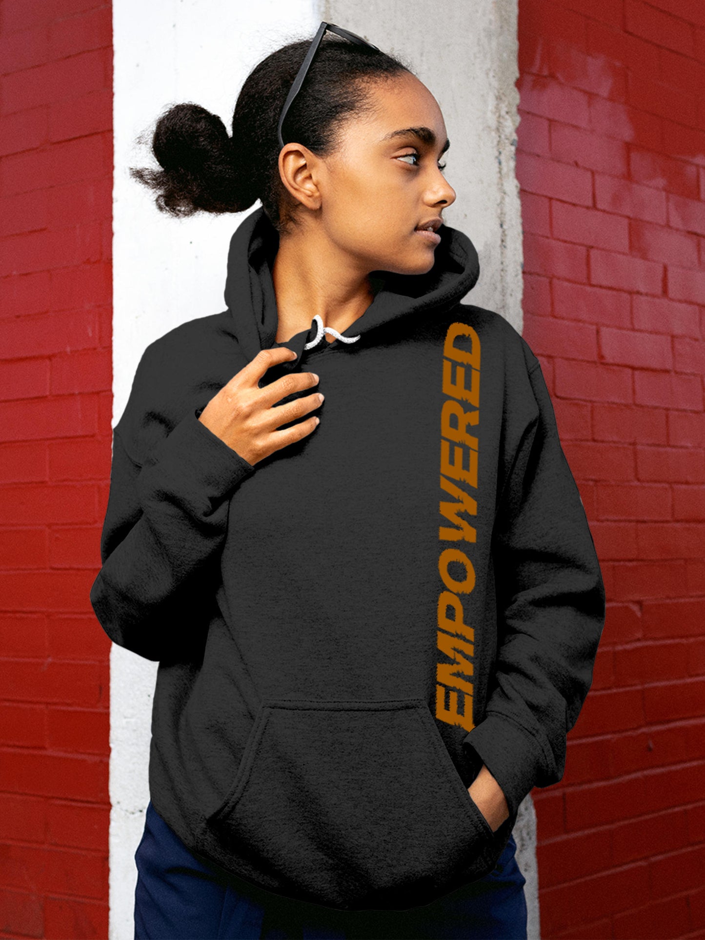 Model wearing Women's Dark Grey Hoodie Sweatshirt with 'Empowered' design, offering effortless style and premium comfort
