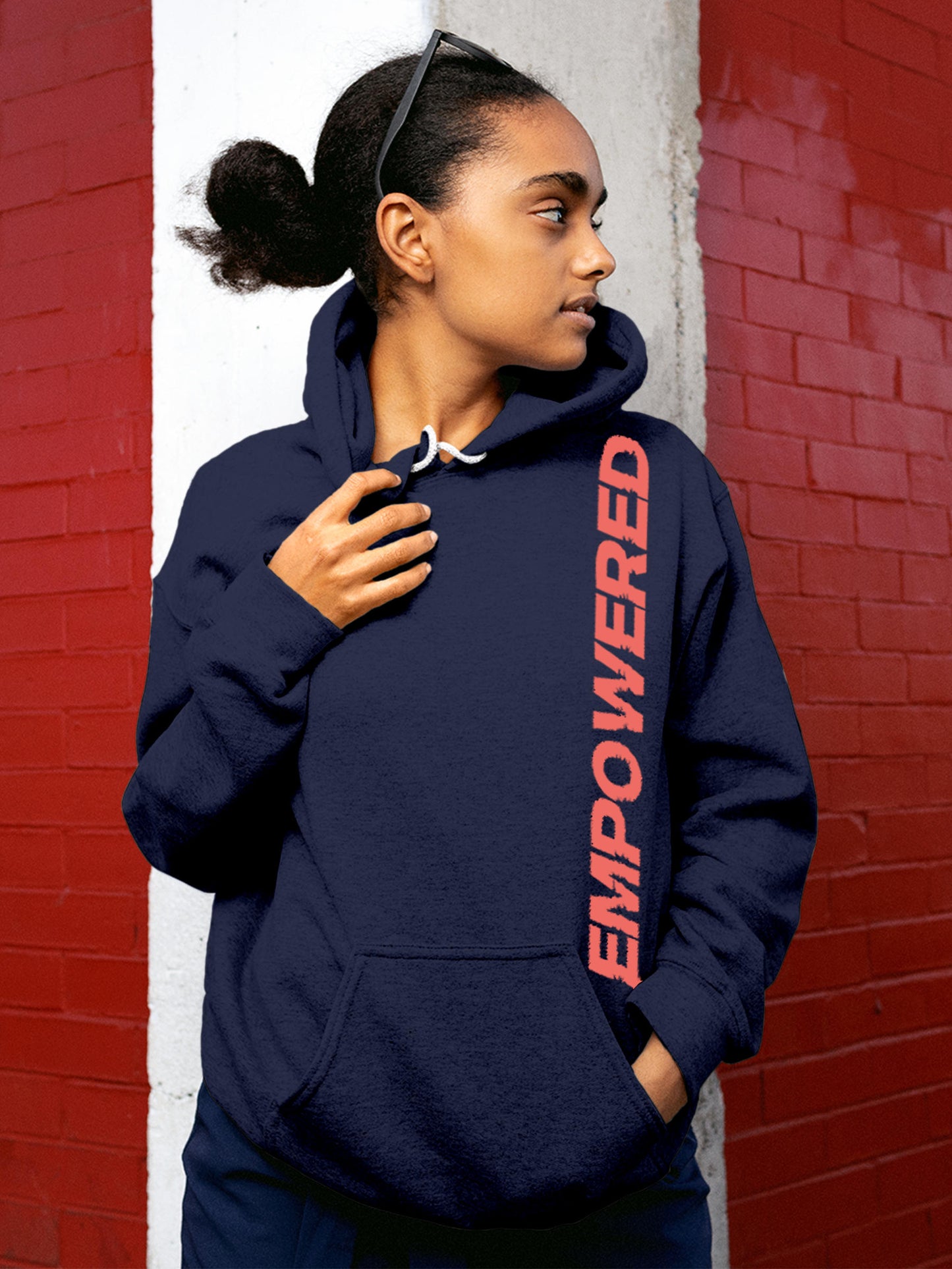 Model wearing Women's Navy Blue Hoodie Sweatshirt with 'Empowered' design, offering effortless style and premium comfort