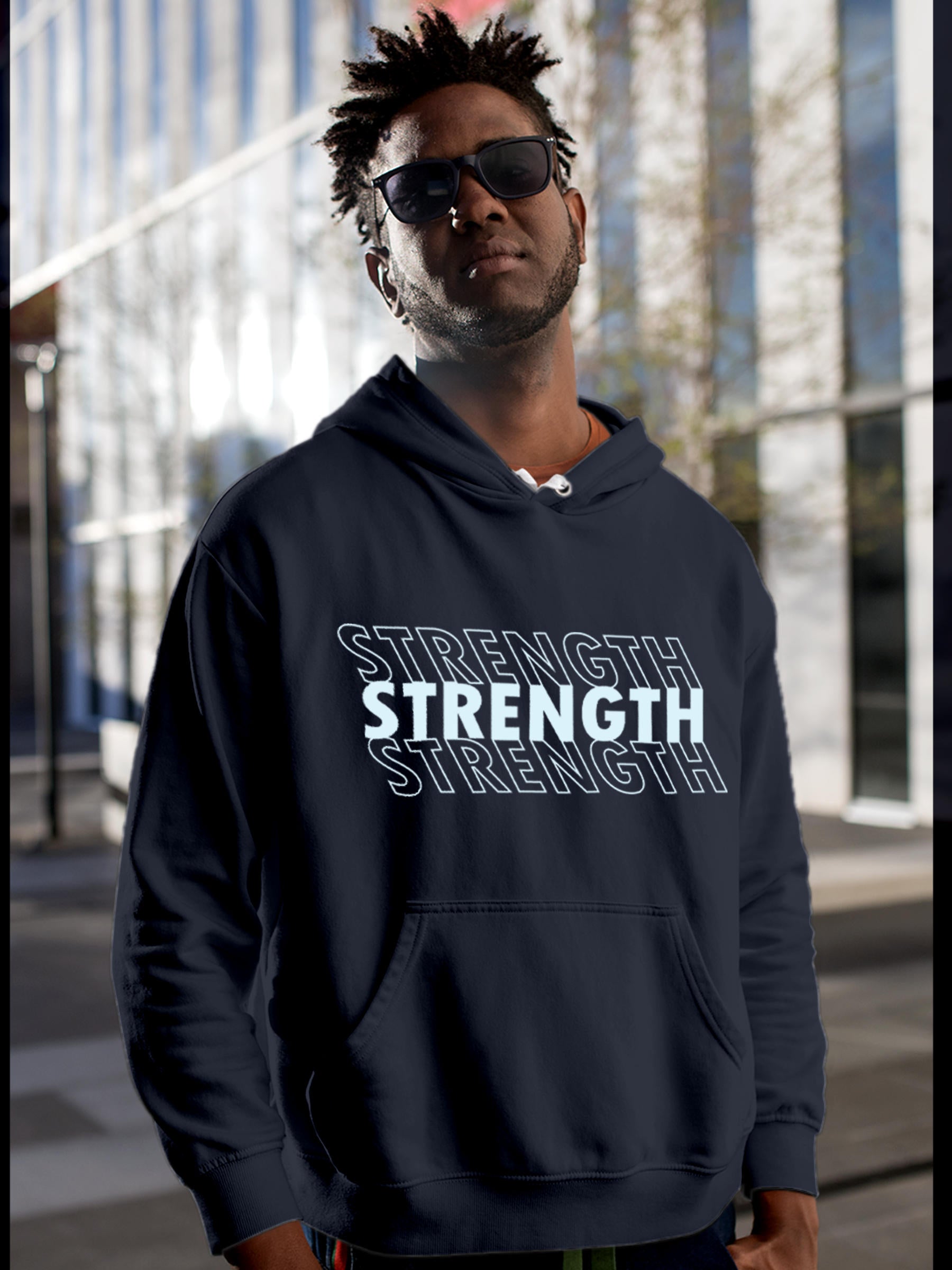 Model wearing Men's Navy Blue Hoodie Sweatshirt with 'Strength' design, offering effortless style and premium comfort