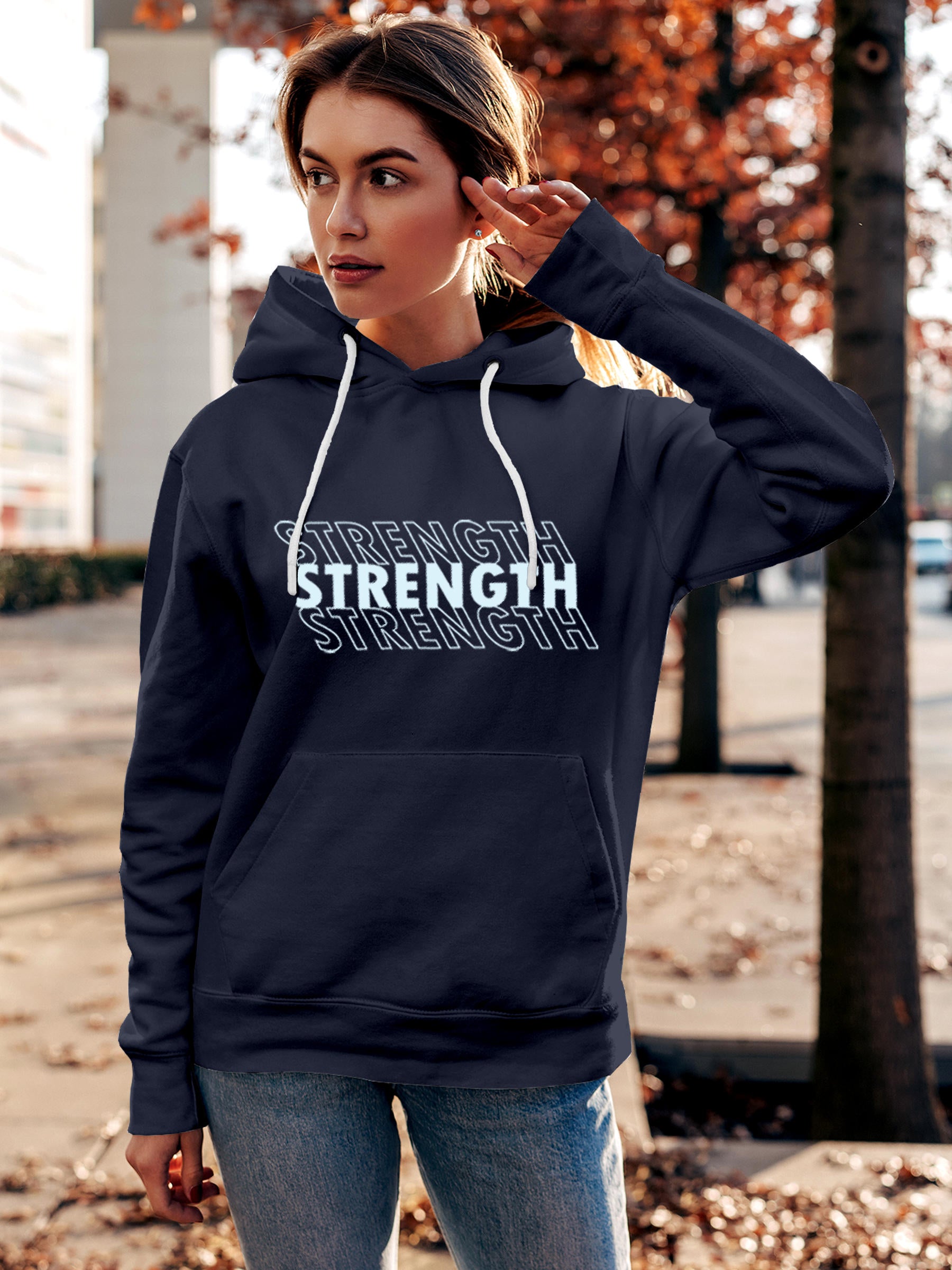Model wearing Women's Navy Blue Hoodie Sweatshirt with 'Strength' design, offering effortless style and premium comfort