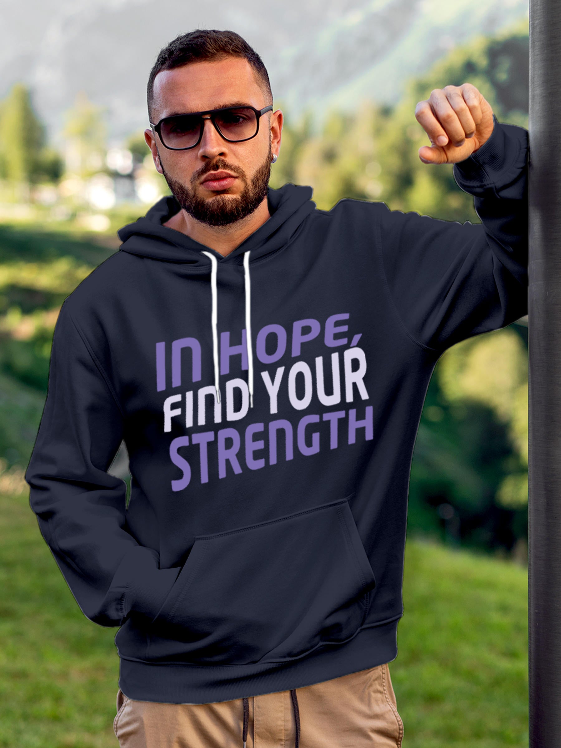 Model wearing Men's Navy Blue Hoodie Sweatshirt with 'In Hope, Find Your Strength' design, offering effortless style and premium comfort
