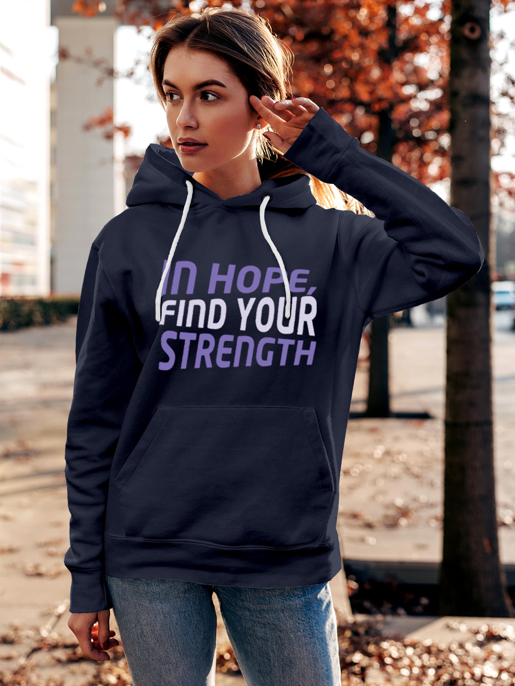 Model wearing Women's Navy Blue Hoodie Sweatshirt with 'In Hope, Find Your Strength' design, offering effortless style and premium comfort