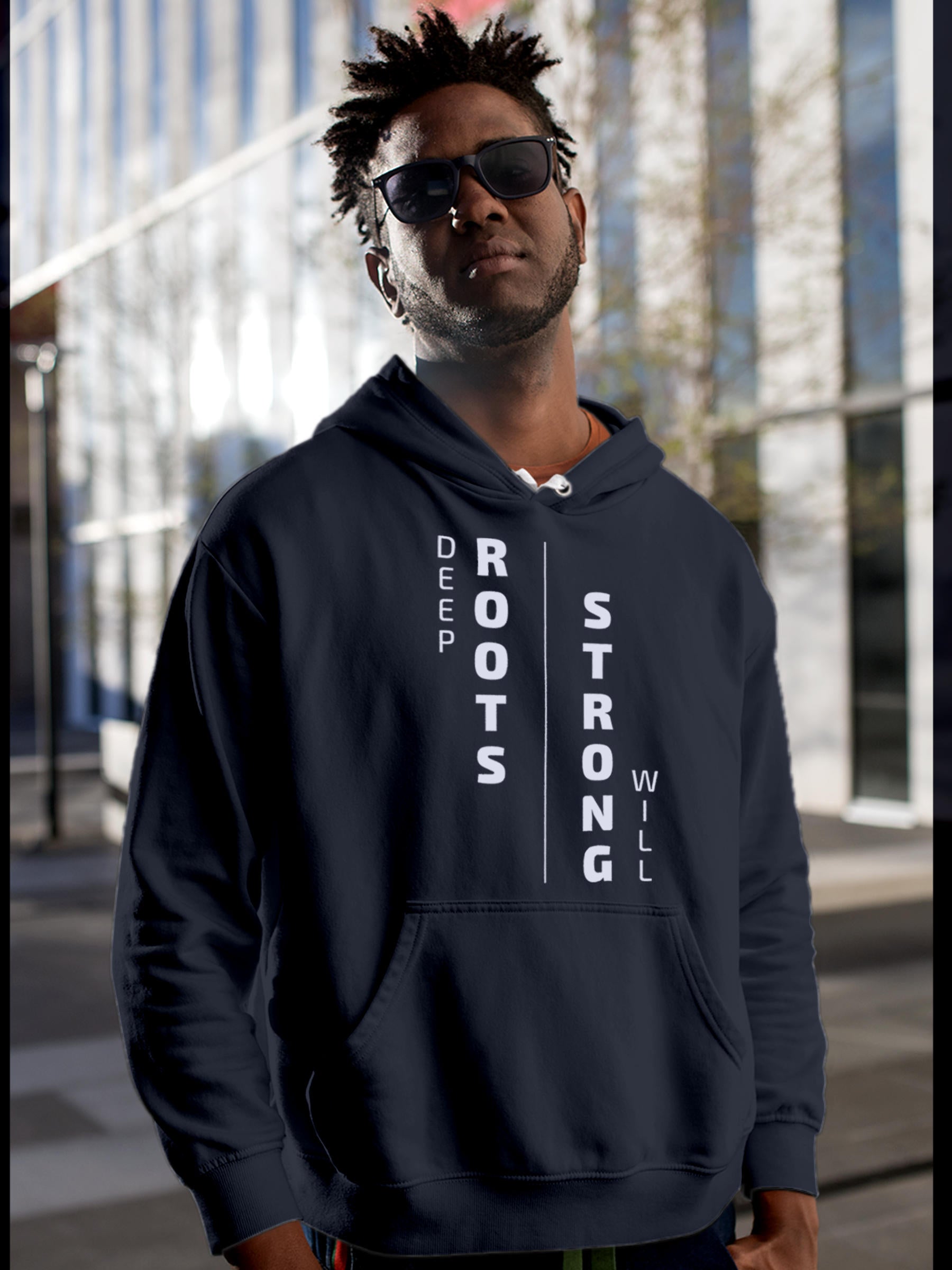 Model wearing Men's Navy Blue Hoodie Sweatshirt with 'Deep Roots Strong Will' design, offering effortless style and premium comfort