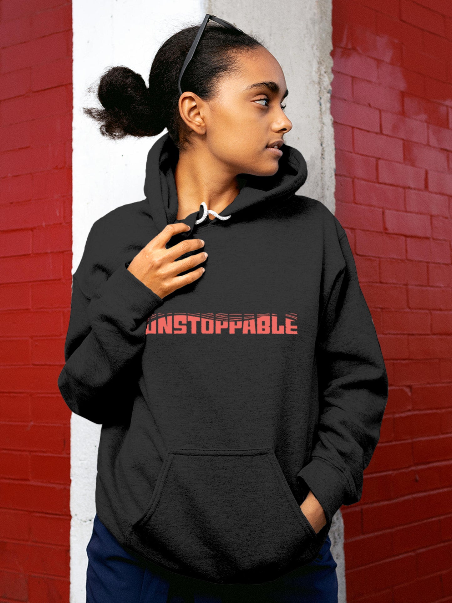Model wearing Women's Dark Grey Hoodie Sweatshirt with 'Unstoppable' design, offering effortless style and premium comfort