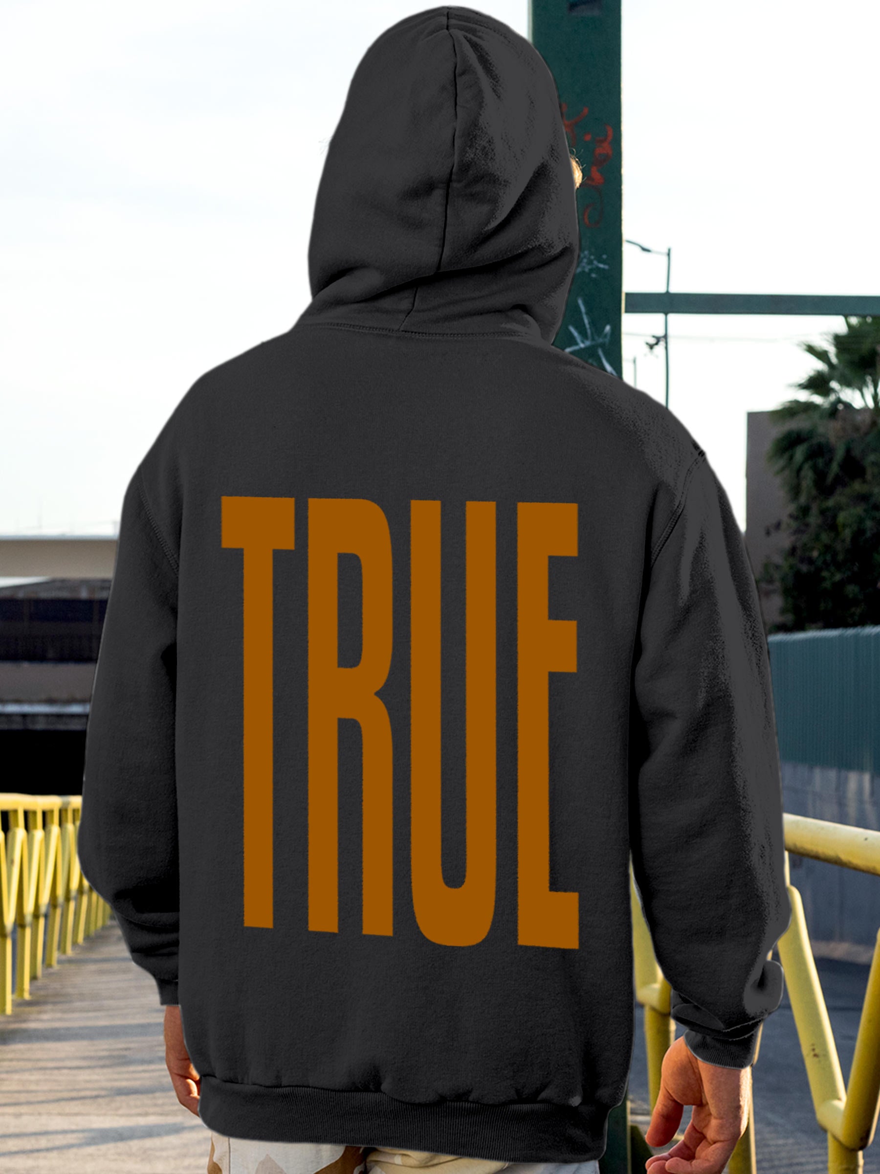 Model wearing Men's Dark Grey Hoodie Sweatshirt with 'Truth' design, offering effortless style and premium comfort