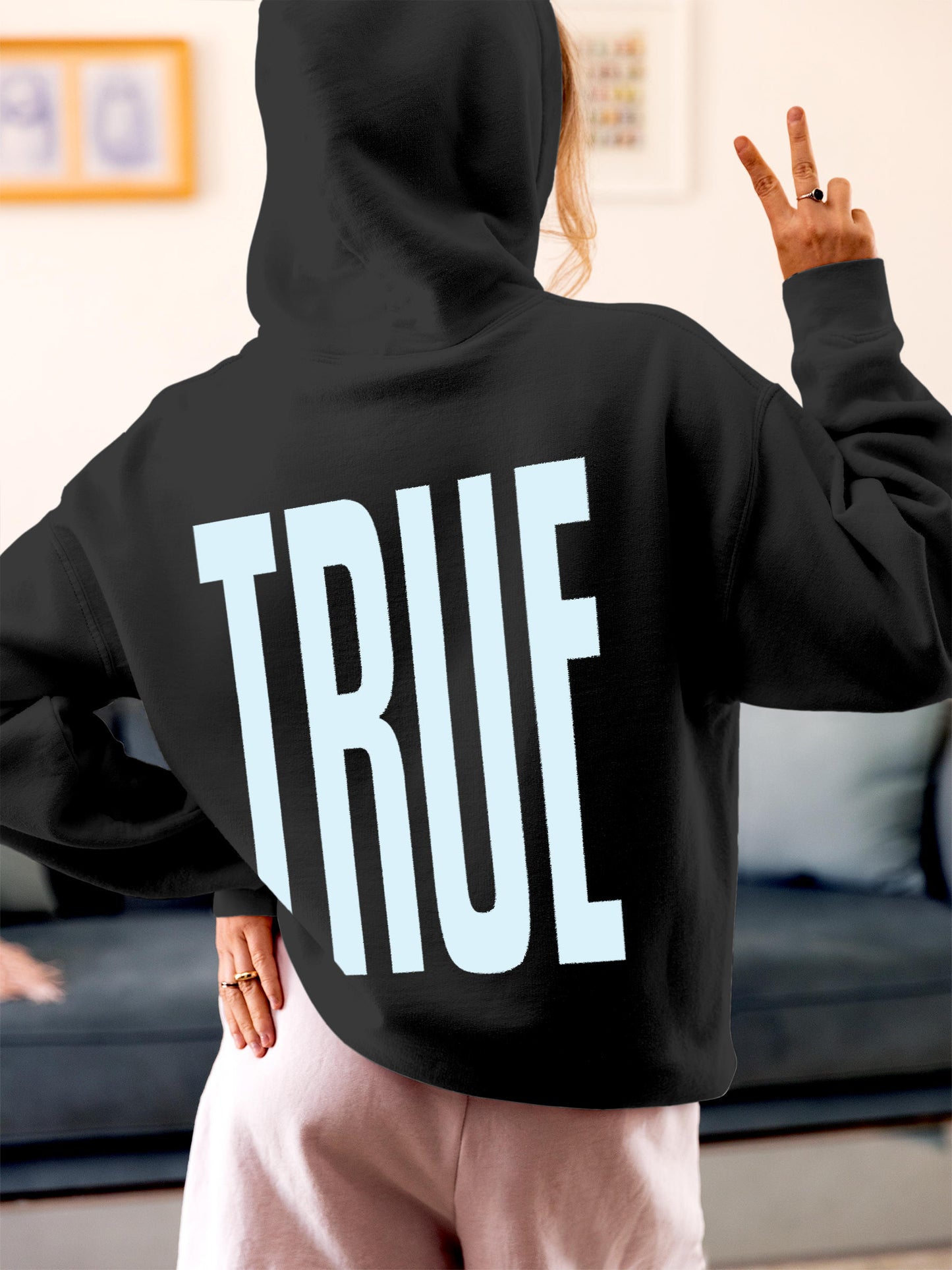 Model wearing Women's Dark Grey Hoodie Sweatshirt with 'Truth' design, offering effortless style and premium comfort