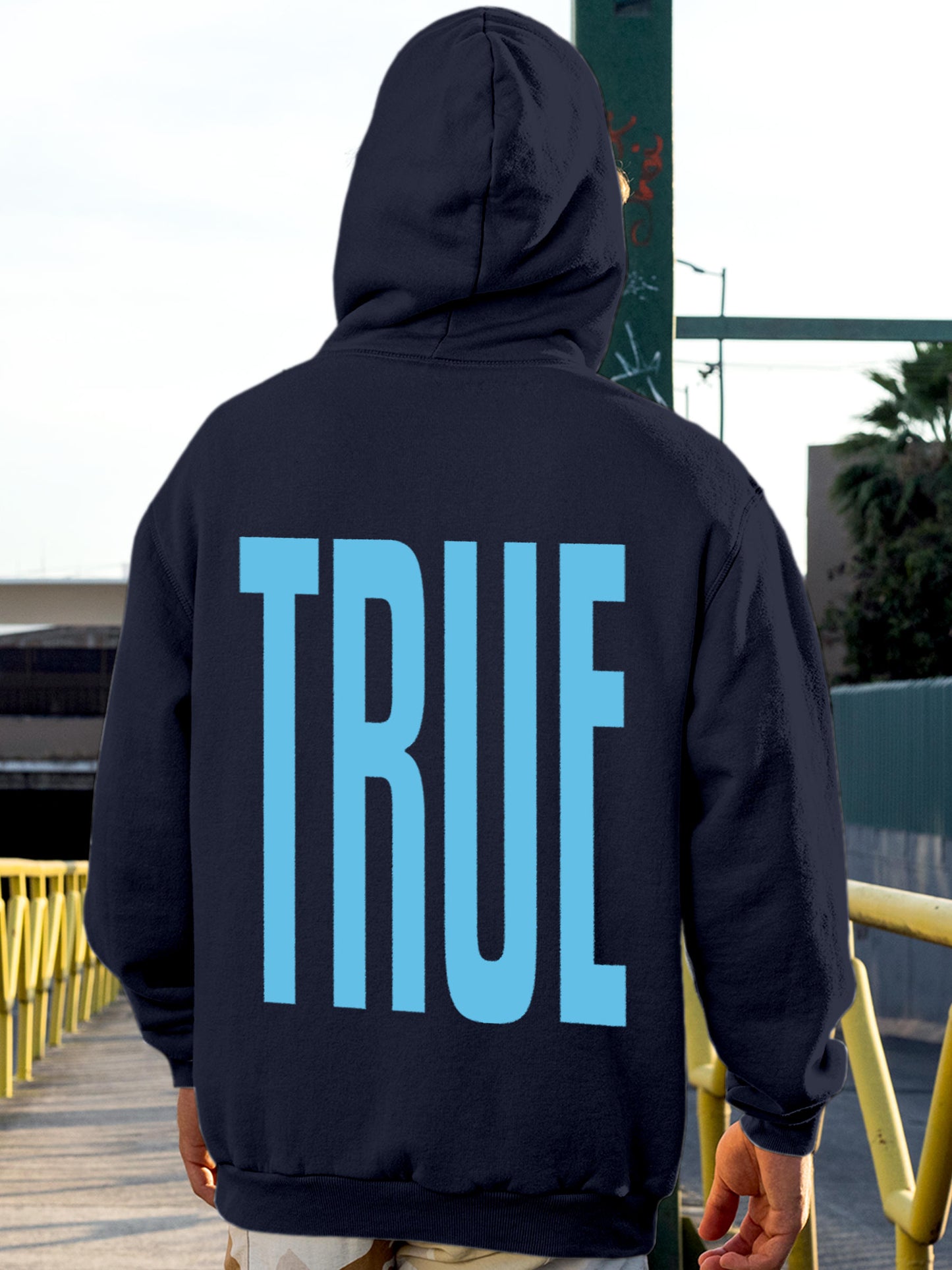 Model wearing Men's Navy Blue Hoodie Sweatshirt with 'Truth' design, offering effortless style and premium comfort