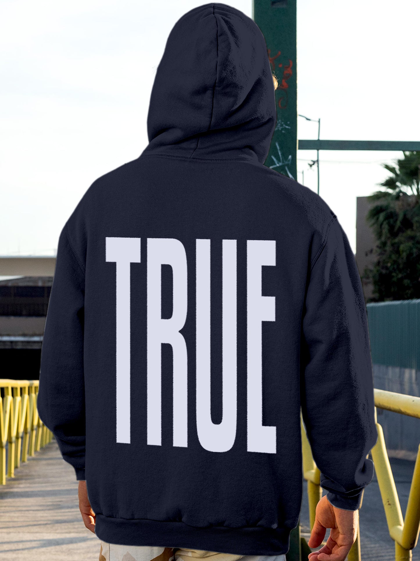 Model wearing Men's Navy Blue Hoodie Sweatshirt with 'Truth' design, offering effortless style and premium comfort