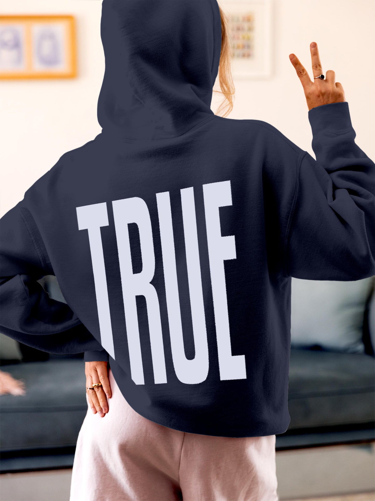 Model wearing Women's Navy Blue Hoodie Sweatshirt with 'Truth' design, offering effortless style and premium comfort