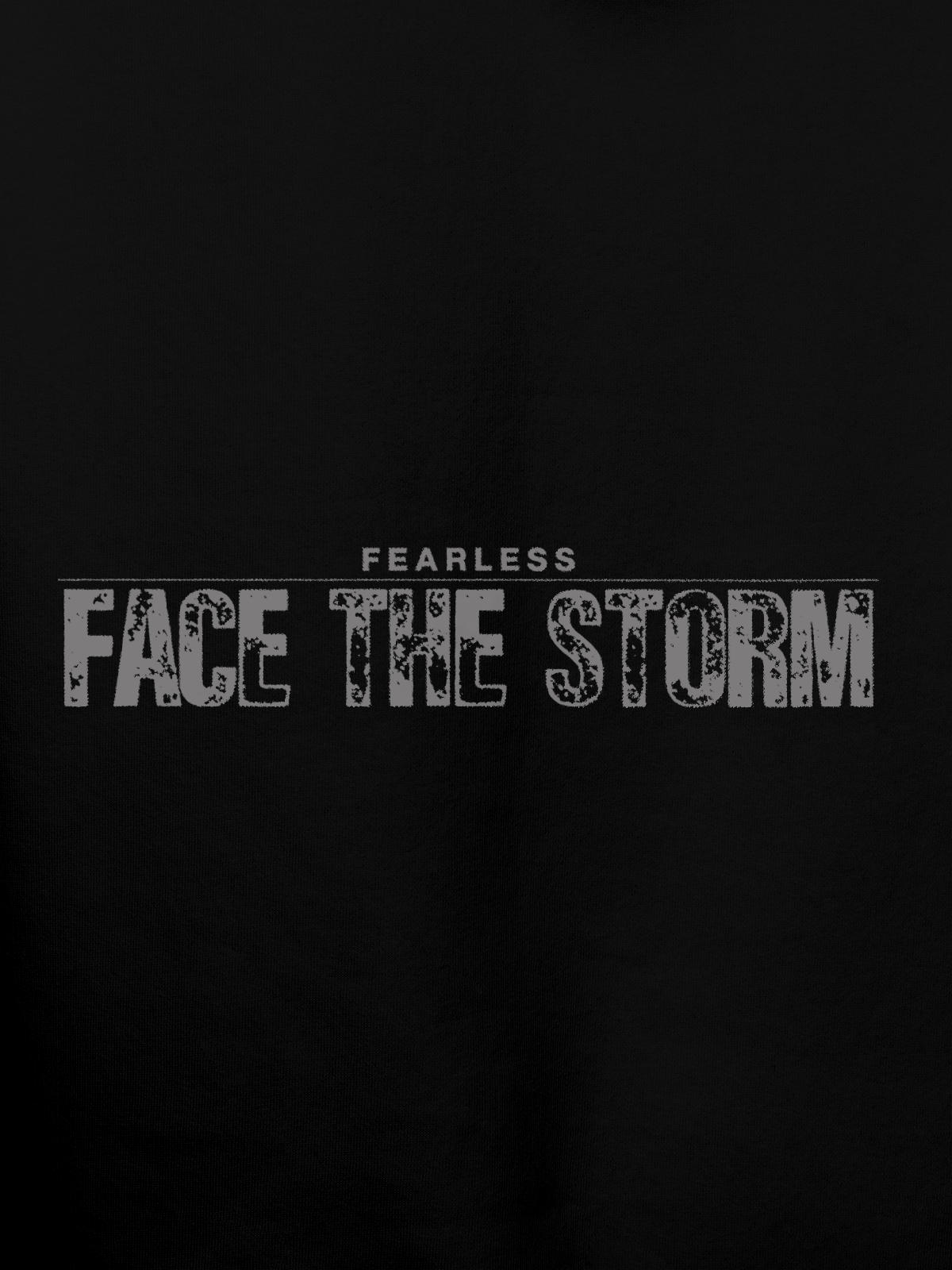 Close up of 'Fearless. Face the Storm' design on Women's Black Hoodie Sweatshirt, highlighting intricate details and vibrant print.