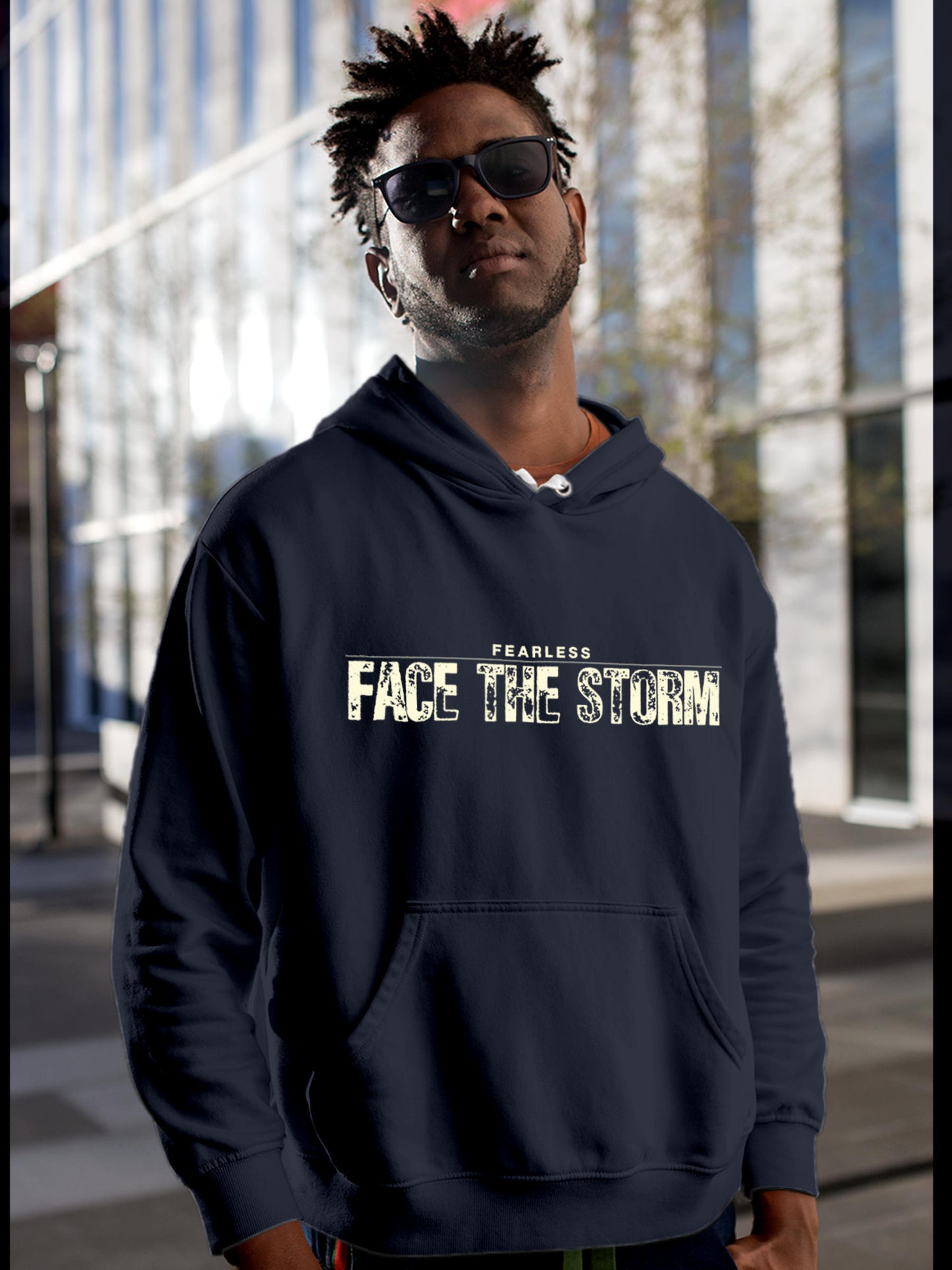 Model wearing Men's Navy Blue Hoodie Sweatshirt with 'Fearless. Face the Storm' design, offering effortless style and premium comfort
