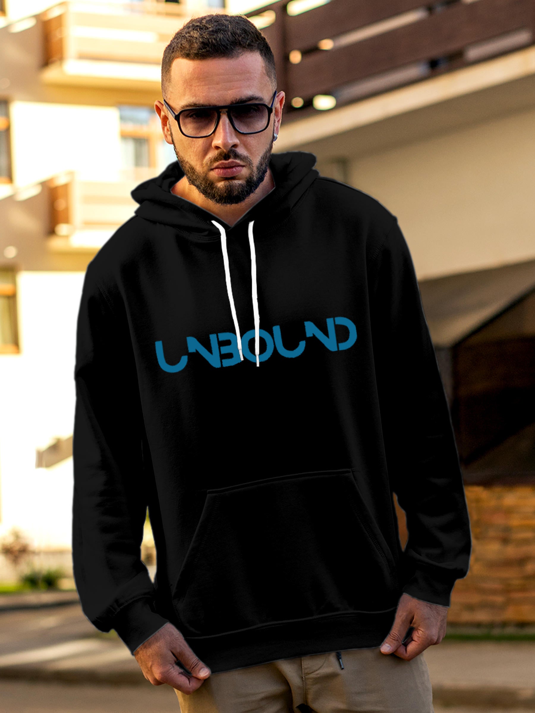 Model wearing Men's Black Hoodie Sweatshirt with 'Unbound' design, offering effortless style and premium comfort