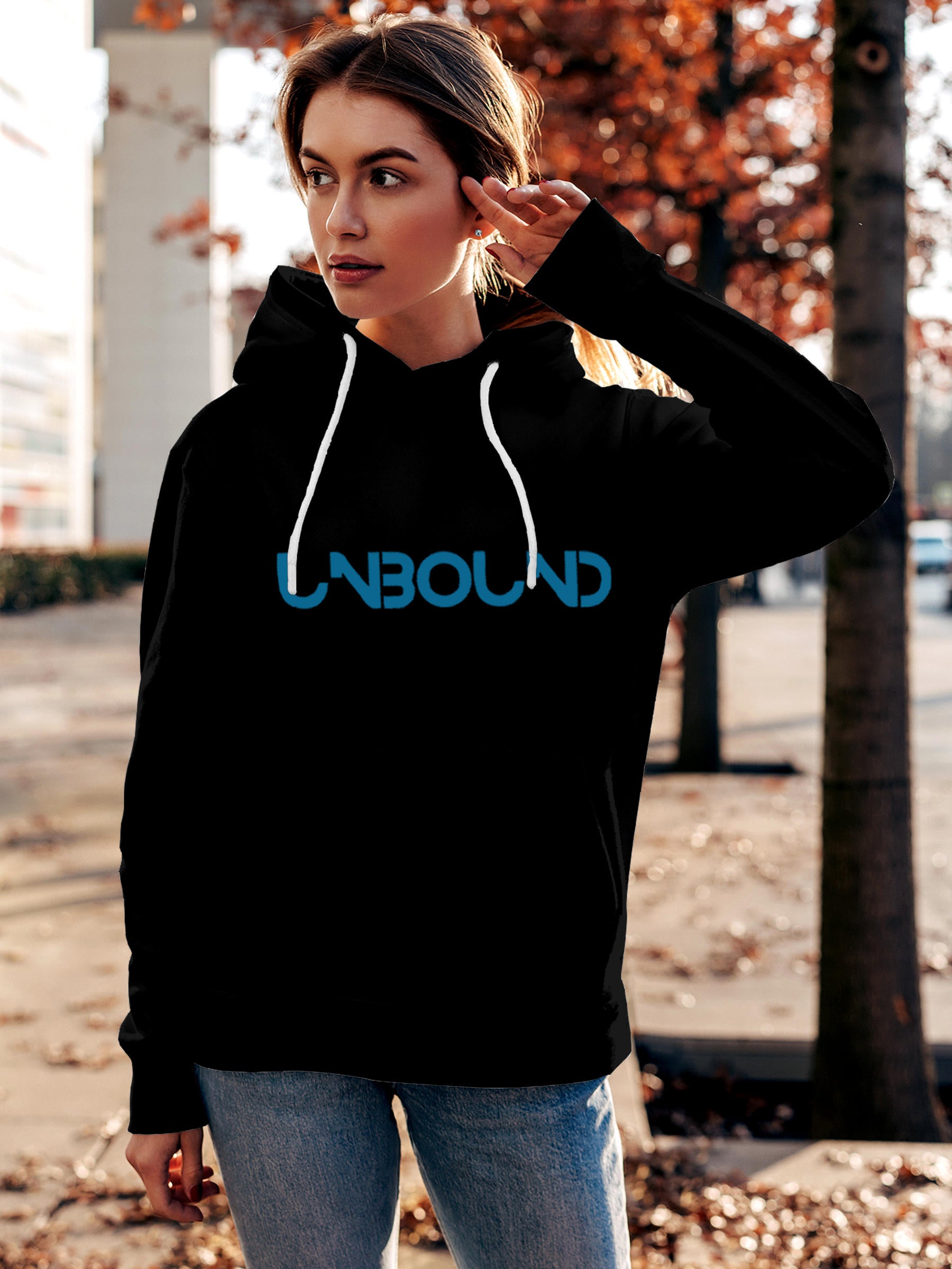 Model wearing Women's Black Hoodie Sweatshirt with 'Unbound' design, offering effortless style and premium comfort