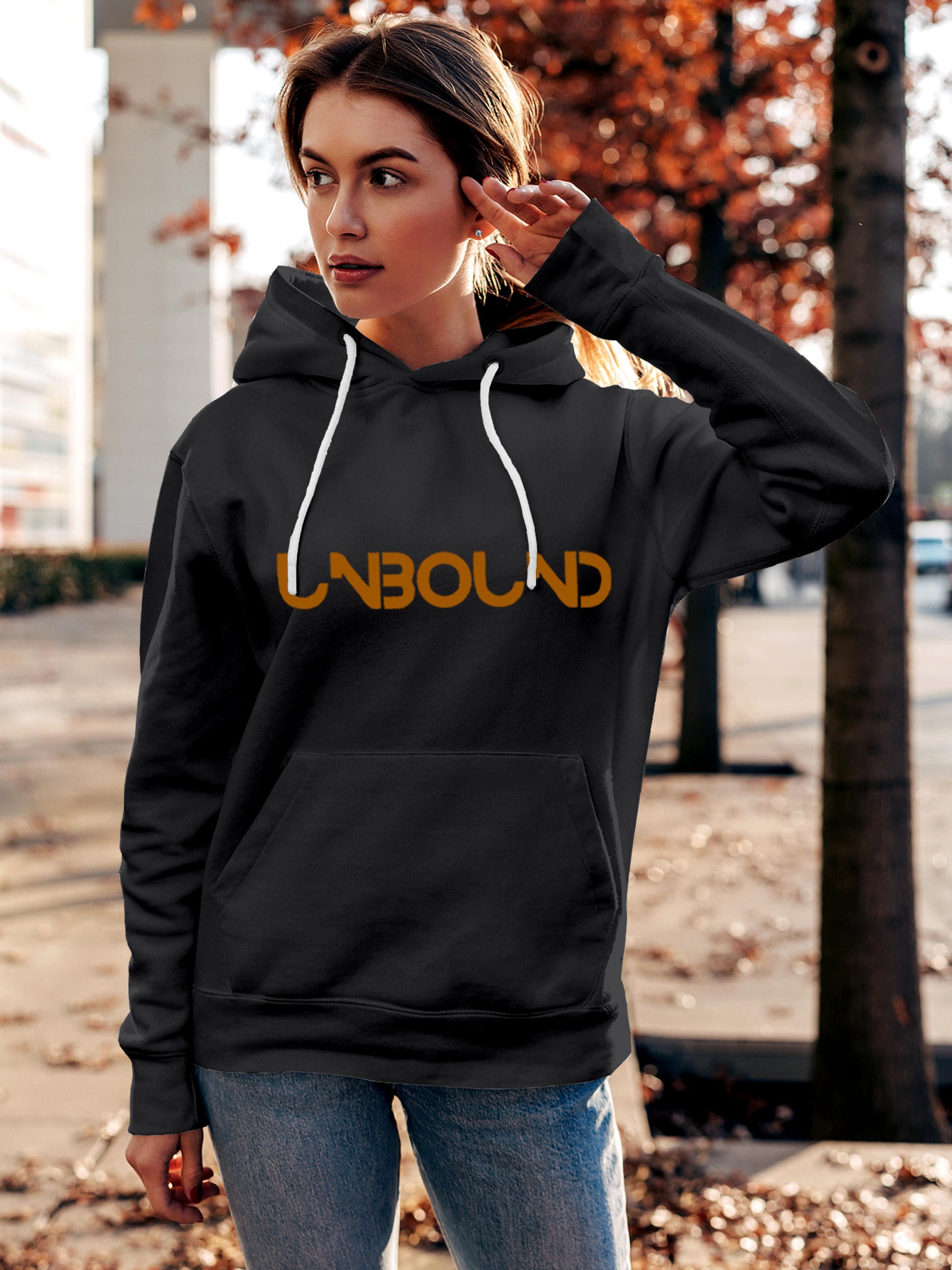 Model wearing Women's Dark Grey Hoodie Sweatshirt with 'Unbound' design, offering effortless style and premium comfort