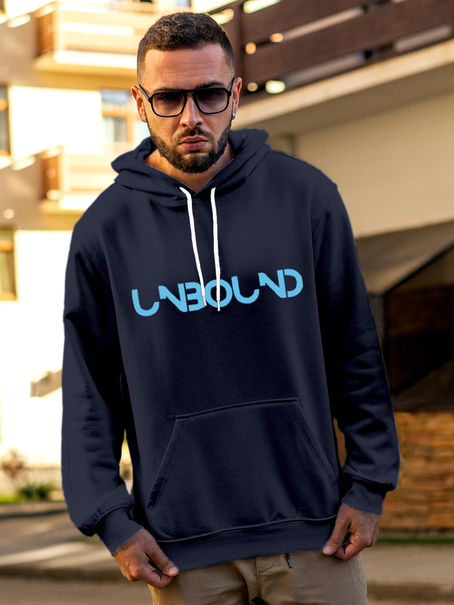 Model wearing Men's Navy Blue Hoodie Sweatshirt with 'Unbound' design, offering effortless style and premium comfort