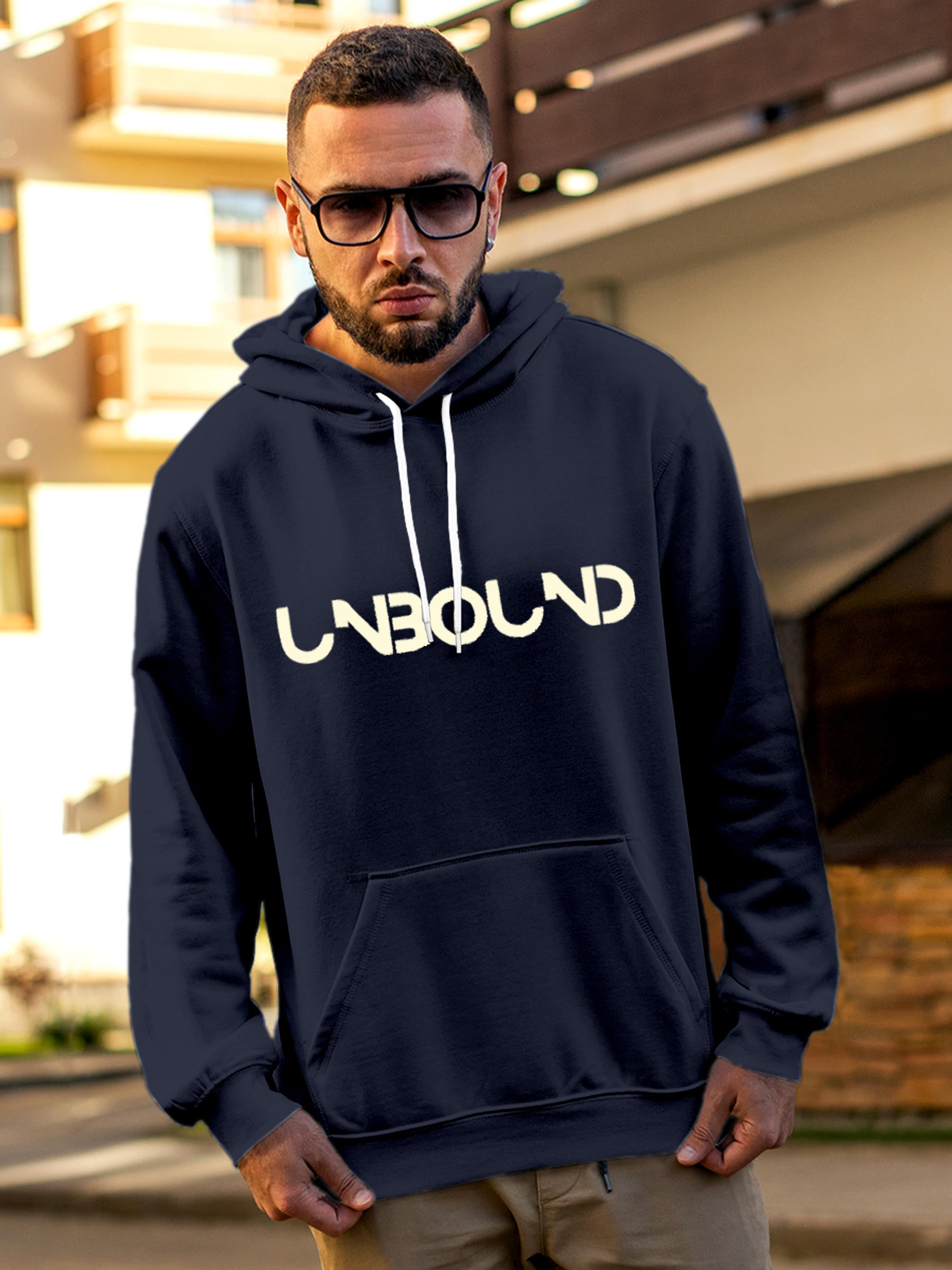 Model wearing Men's Navy Blue Hoodie Sweatshirt with 'Unbound' design, offering effortless style and premium comfort