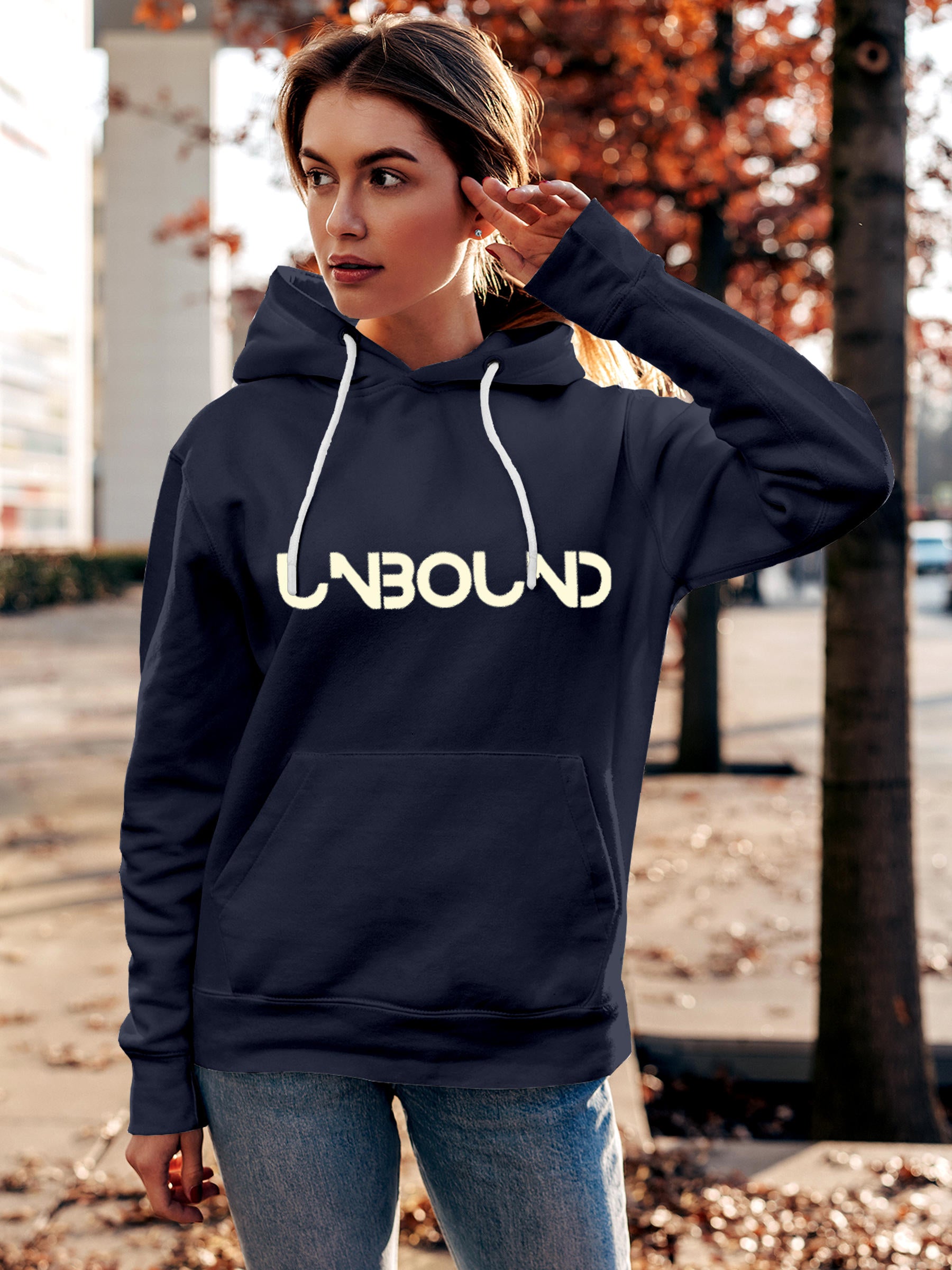 Model wearing Women's Navy Blue Hoodie Sweatshirt with 'Unbound' design, offering effortless style and premium comfort