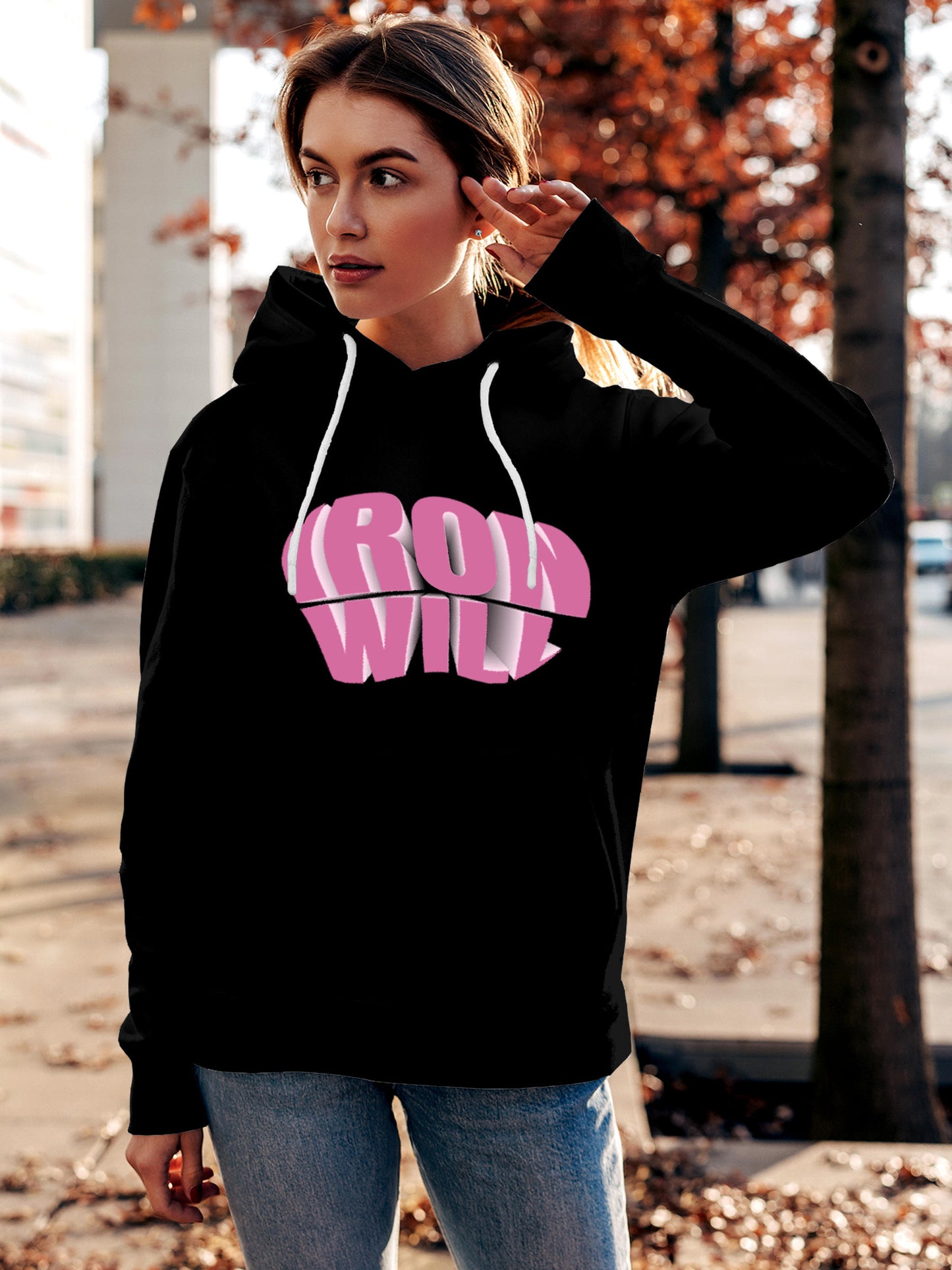 Model wearing Women's Black Hoodie Sweatshirt with 'Iron Will' design, offering effortless style and premium comfort