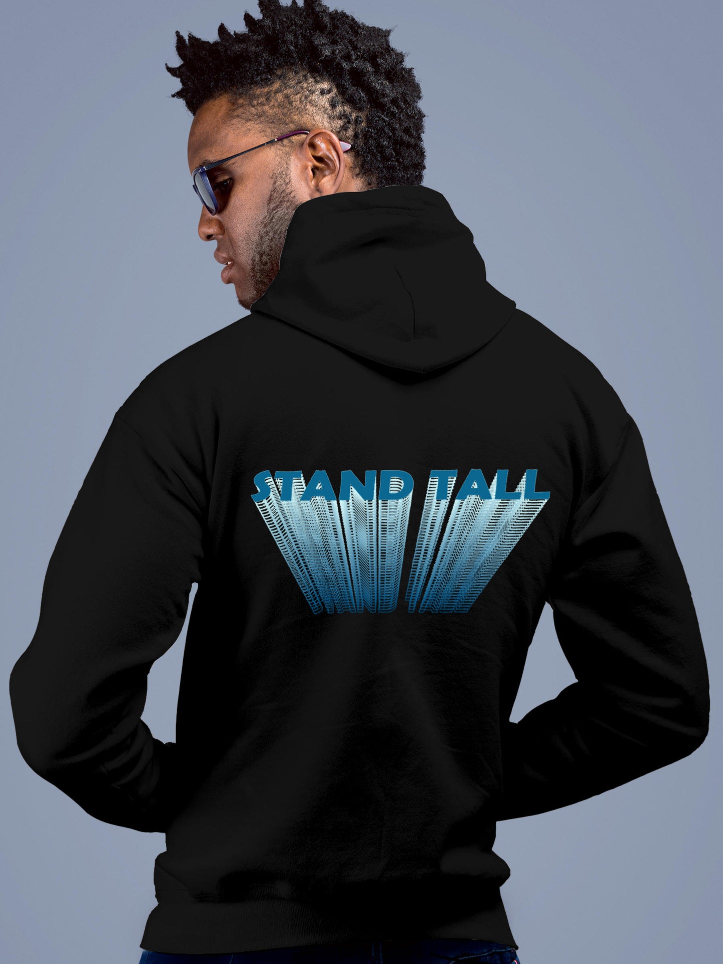 Model wearing Men's Black Hoodie Sweatshirt with 'Stand Tall' design, offering effortless style and premium comfort