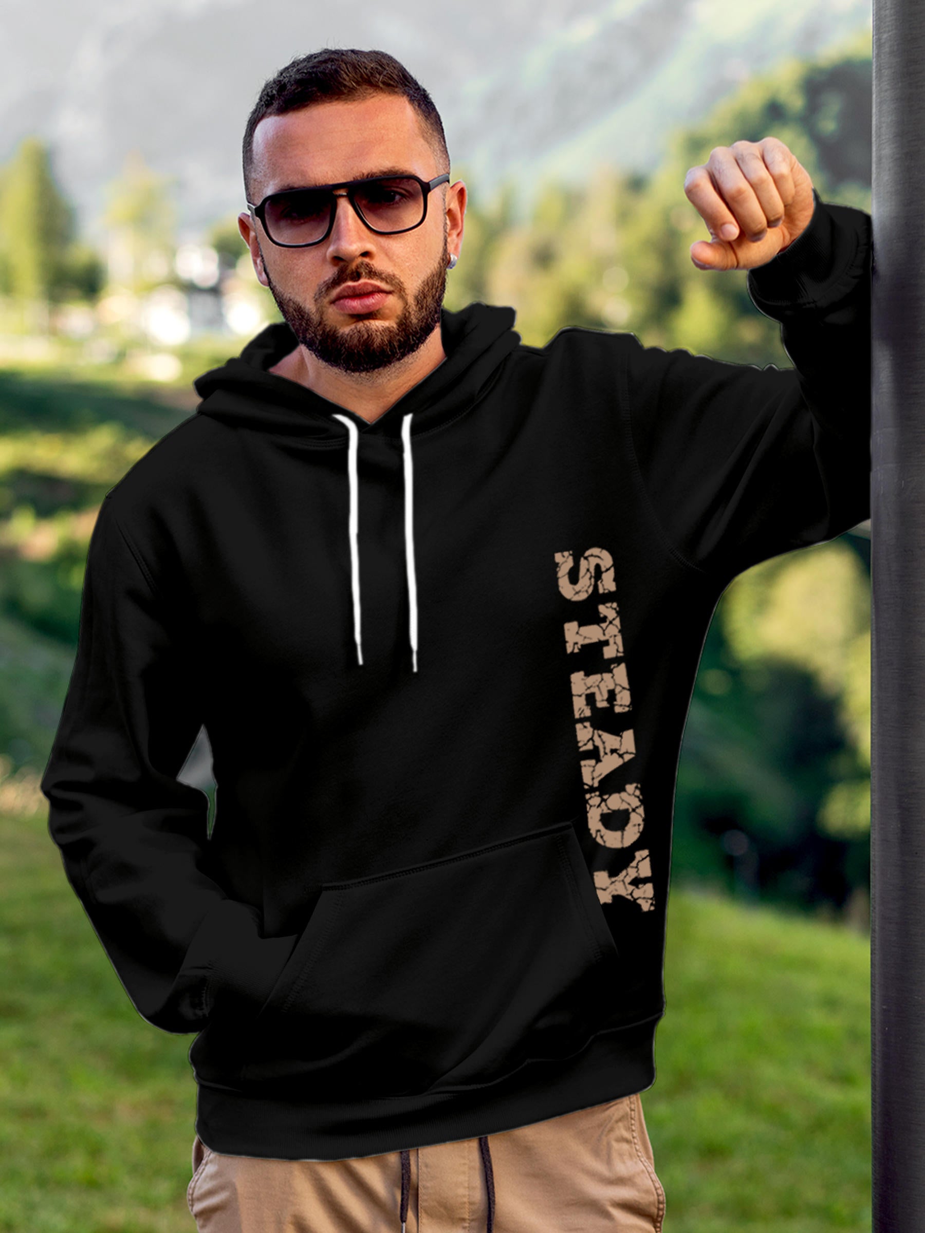 Model wearing Men's Black Hoodie Sweatshirt with 'Steady' design, offering effortless style and premium comfort