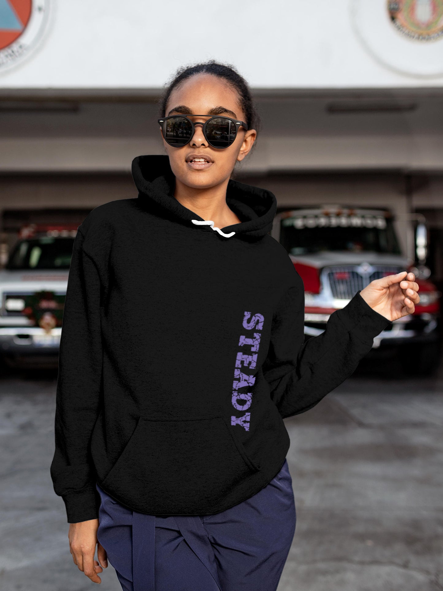 Model wearing Women's Black Hoodie Sweatshirt with 'Steady' design, offering effortless style and premium comfort