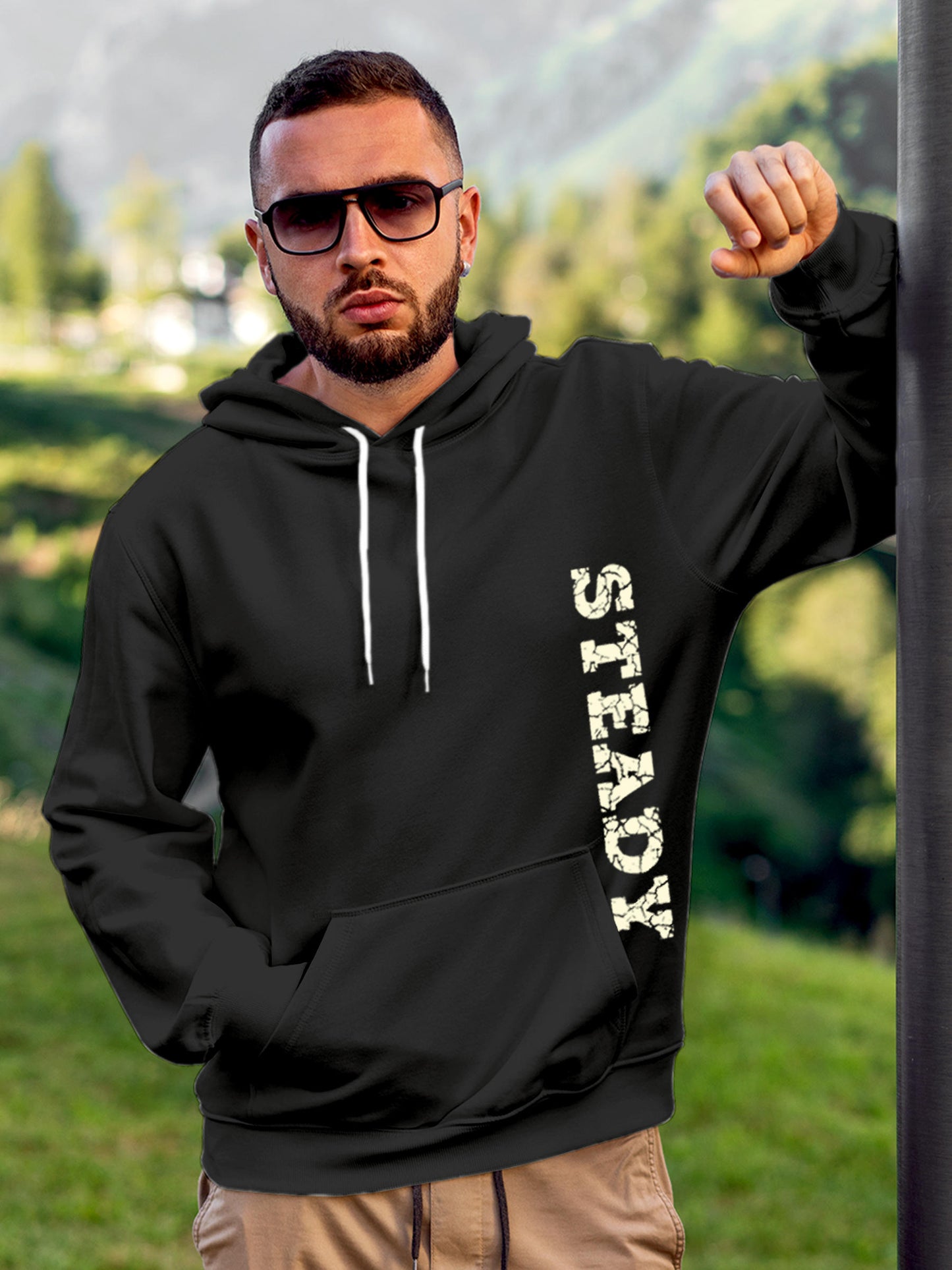 Model wearing Men's Dark Grey Hoodie Sweatshirt with 'Steady' design, offering effortless style and premium comfort