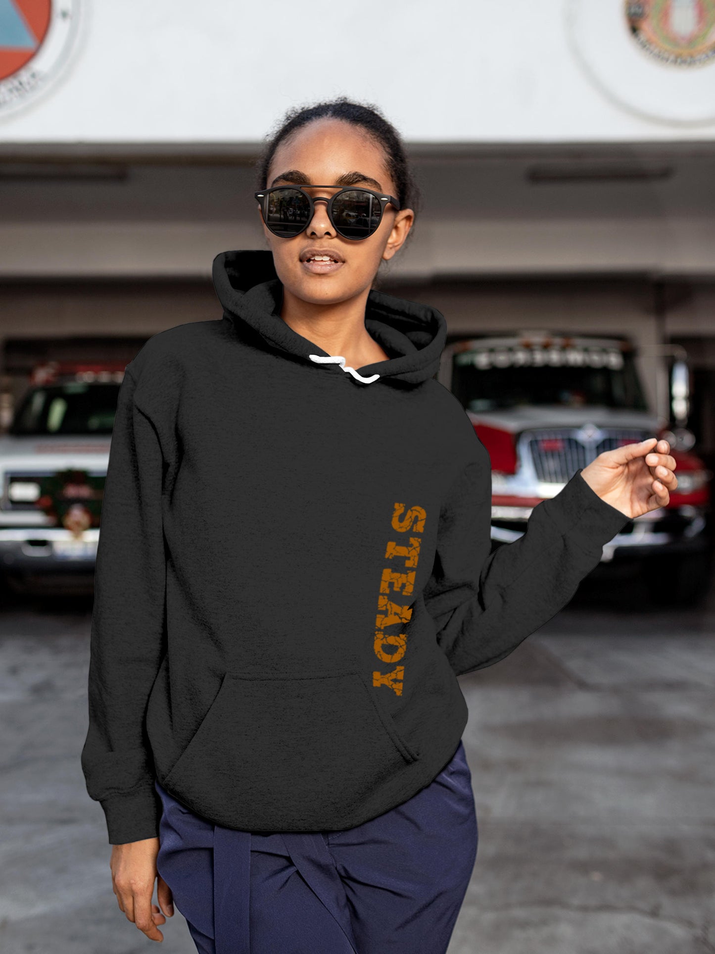 Model wearing Women's Dark Grey Hoodie Sweatshirt with 'Steady' design, offering effortless style and premium comfort
