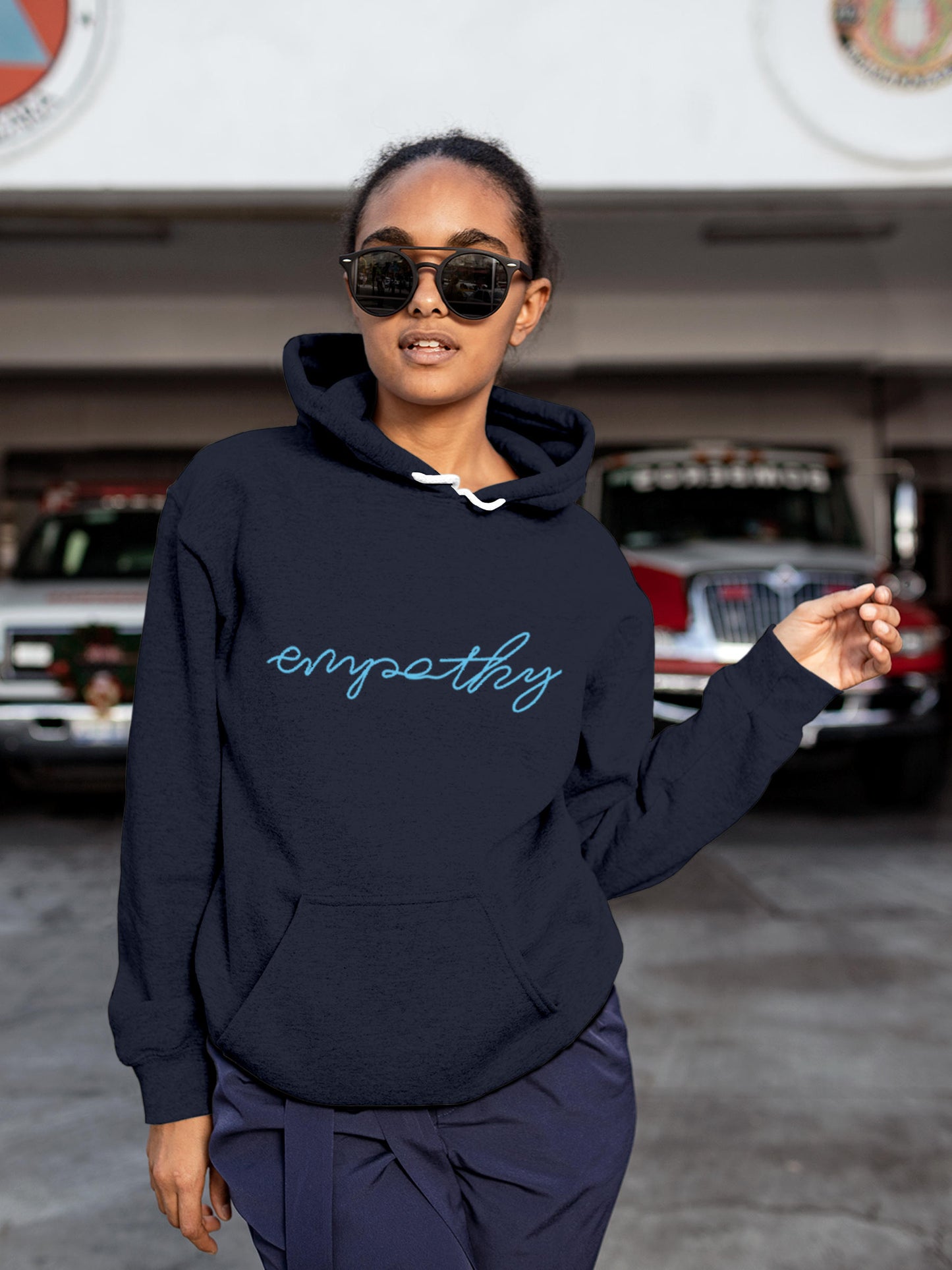 Model wearing Women's Navy Blue Hoodie Sweatshirt with 'Empathy' design, offering effortless style and premium comfort