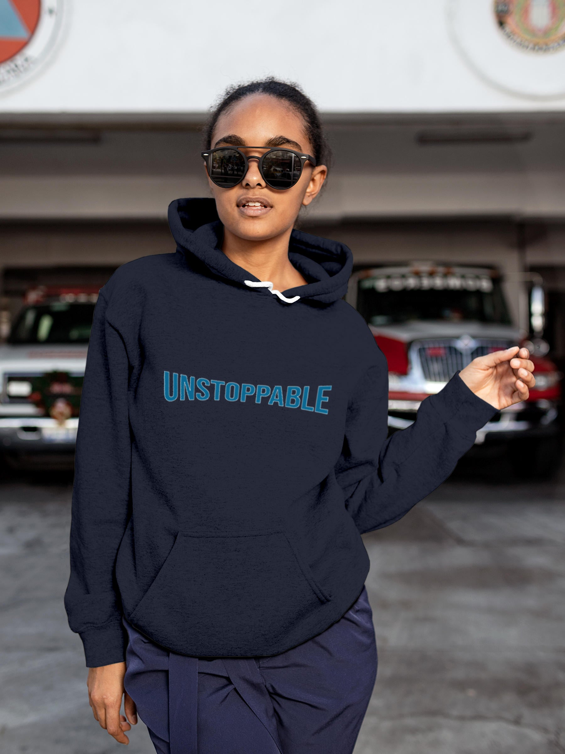 Model wearing Women's Navy Blue Hoodie Sweatshirt with 'Unstoppable' design, offering effortless style and premium comfort