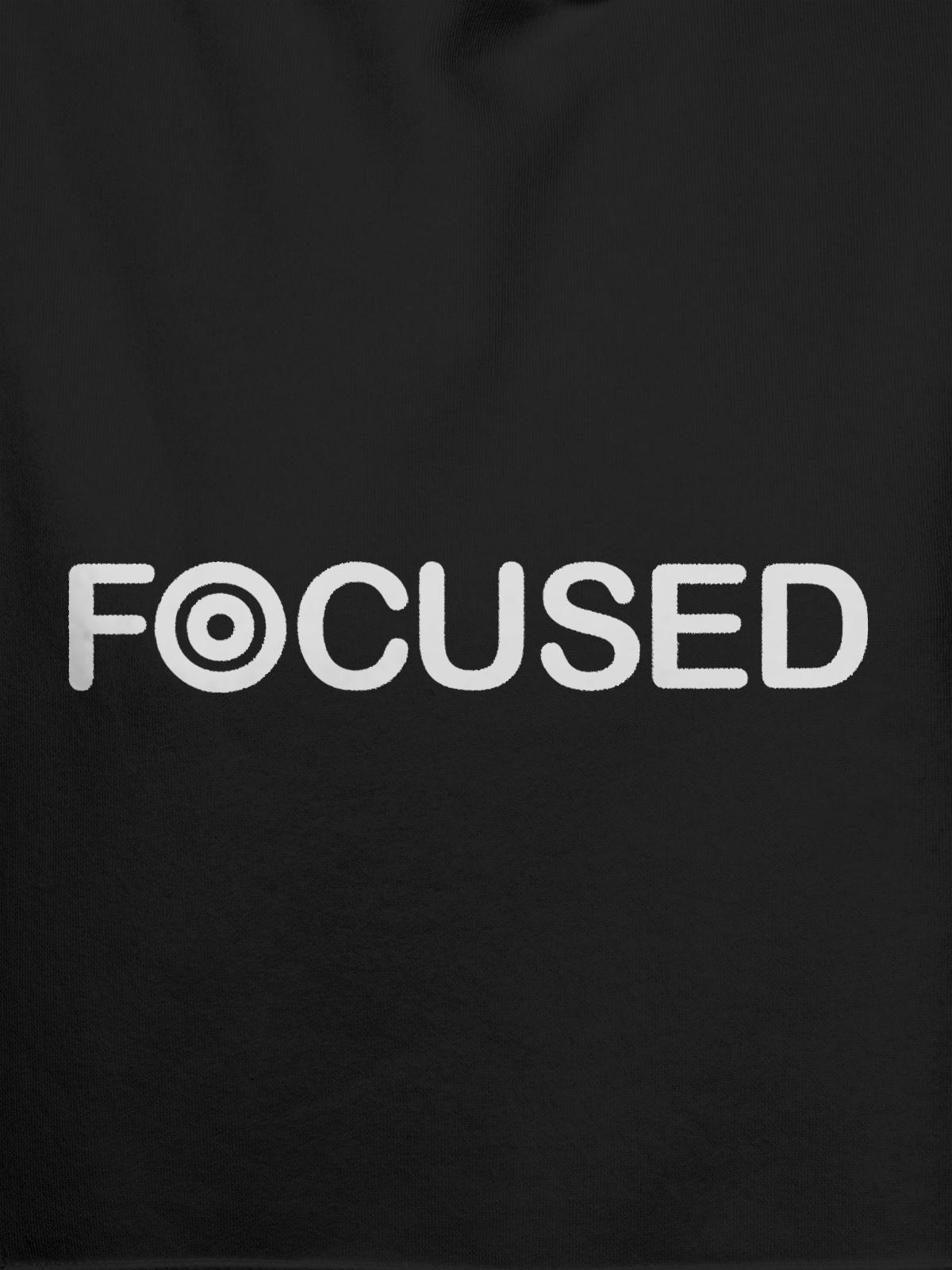 Close up of 'Focused' design on Men's Dark Grey Hoodie Sweatshirt, highlighting intricate details and vibrant print.