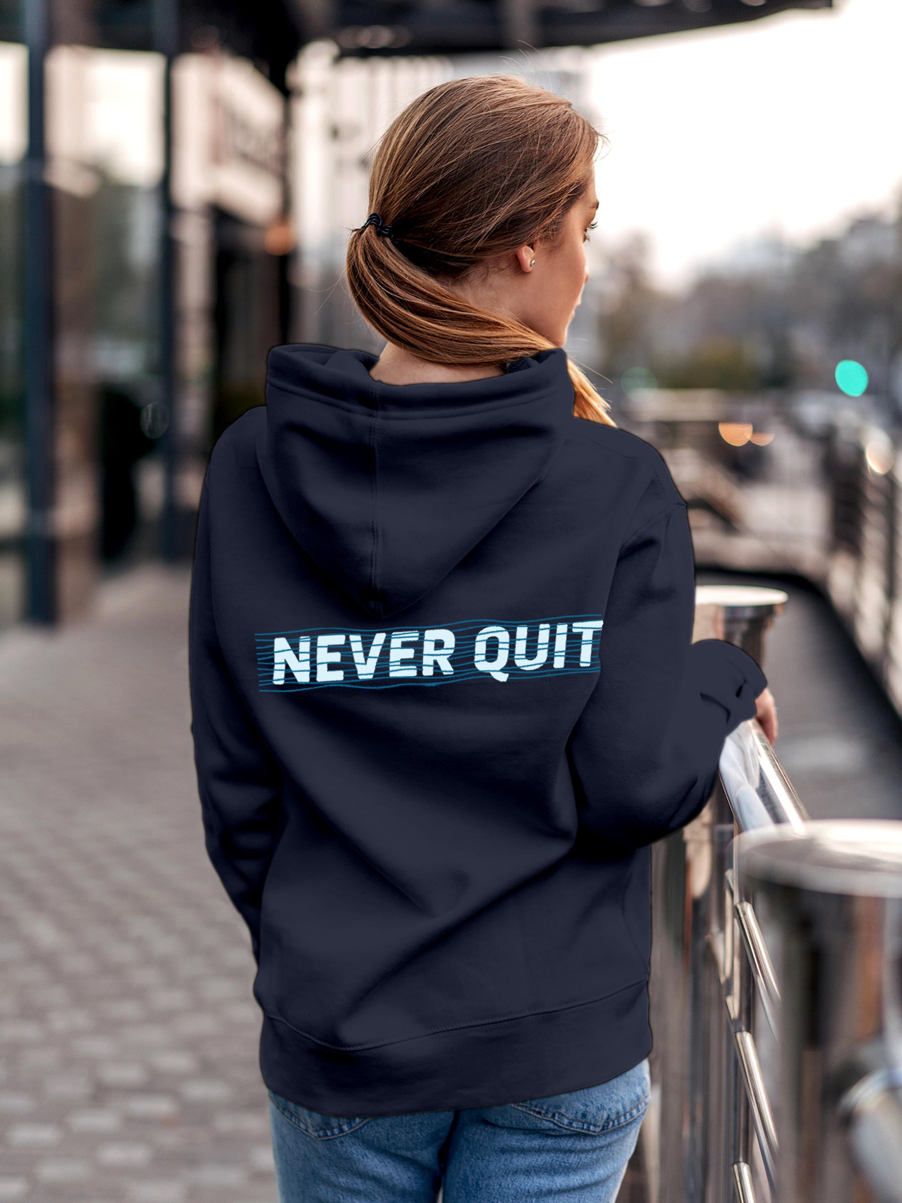 Model wearing Women's Navy Blue Hoodie Sweatshirt with 'Never Quit' design, offering effortless style and premium comfort