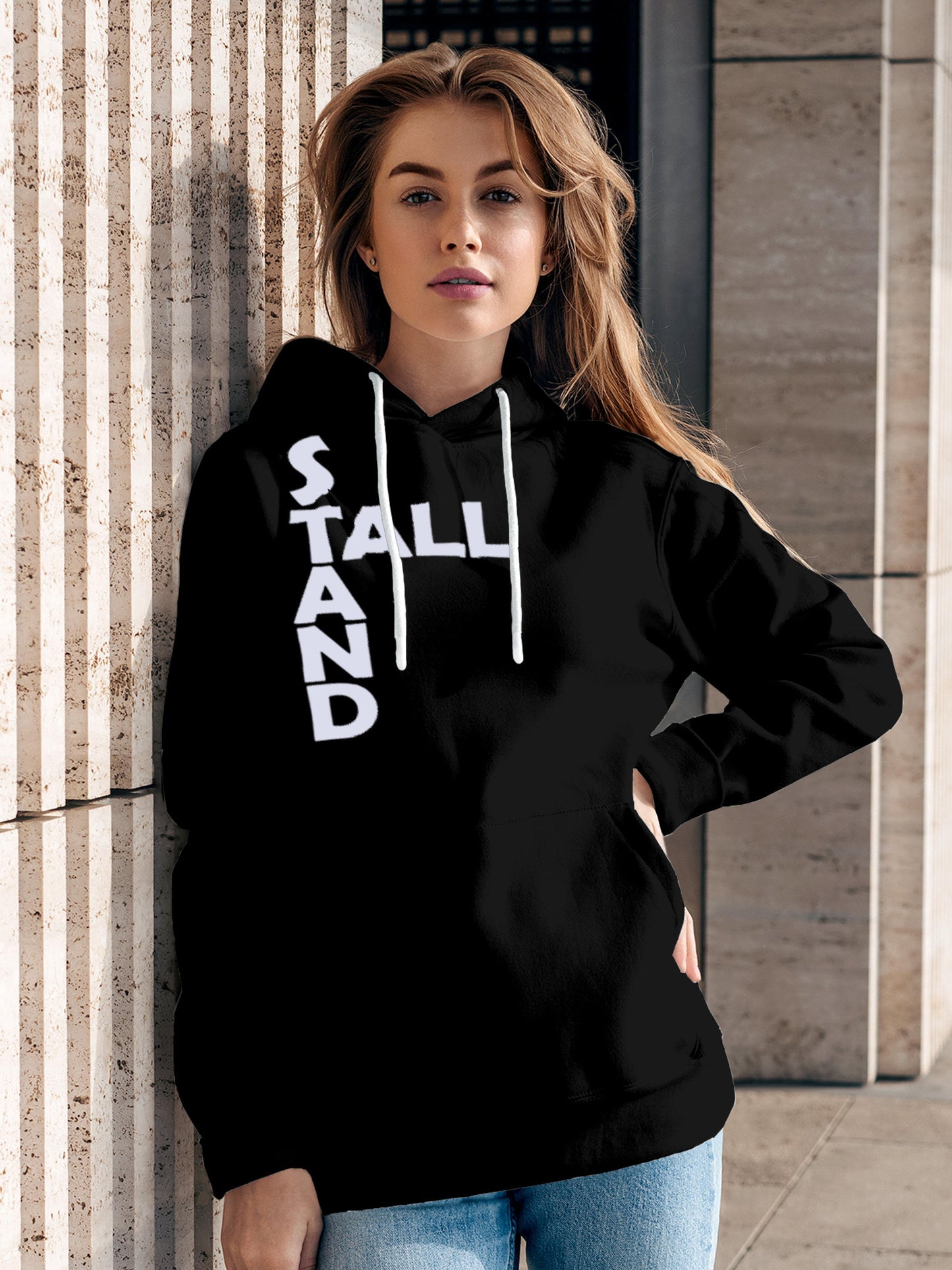 Model wearing Women's Black Hoodie Sweatshirt with 'Stand Tall' design, offering effortless style and premium comfort