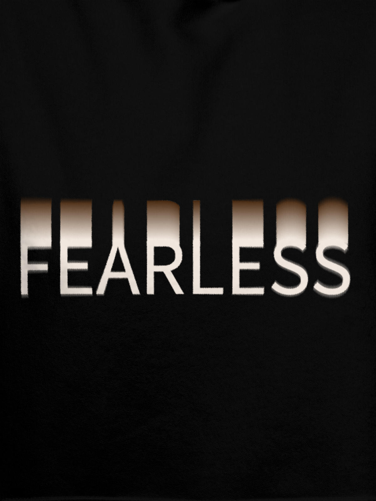 Close up of 'Fearless' design on Women's Black Hoodie Sweatshirt, highlighting intricate details and vibrant print.