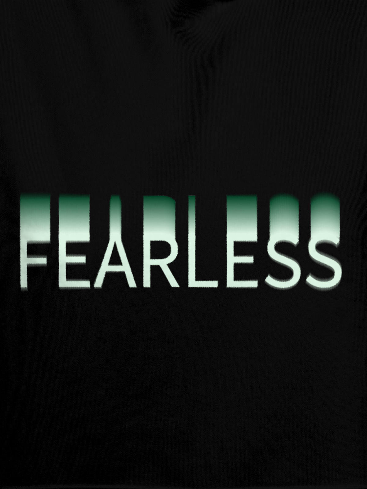 Close up of 'Fearless' design on Women's Black Hoodie Sweatshirt, highlighting intricate details and vibrant print.