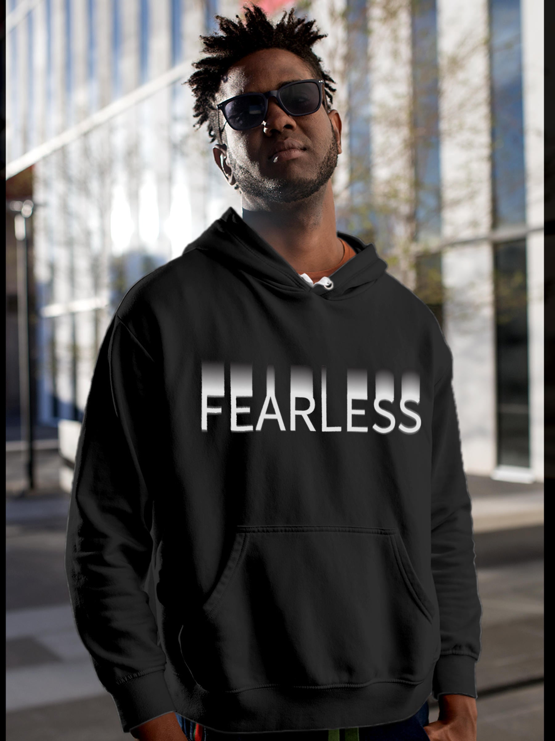 Model wearing Men's Dark Grey Hoodie Sweatshirt with 'Fearless' design, offering effortless style and premium comfort