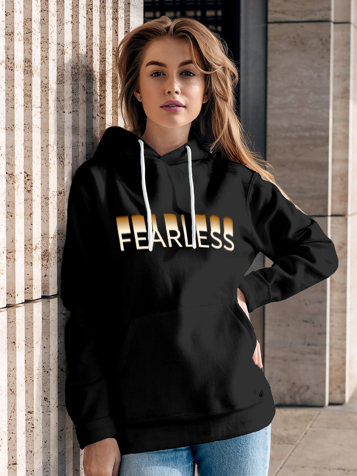 Model wearing Women's Dark Grey Hoodie Sweatshirt with 'Fearless' design, offering effortless style and premium comfort